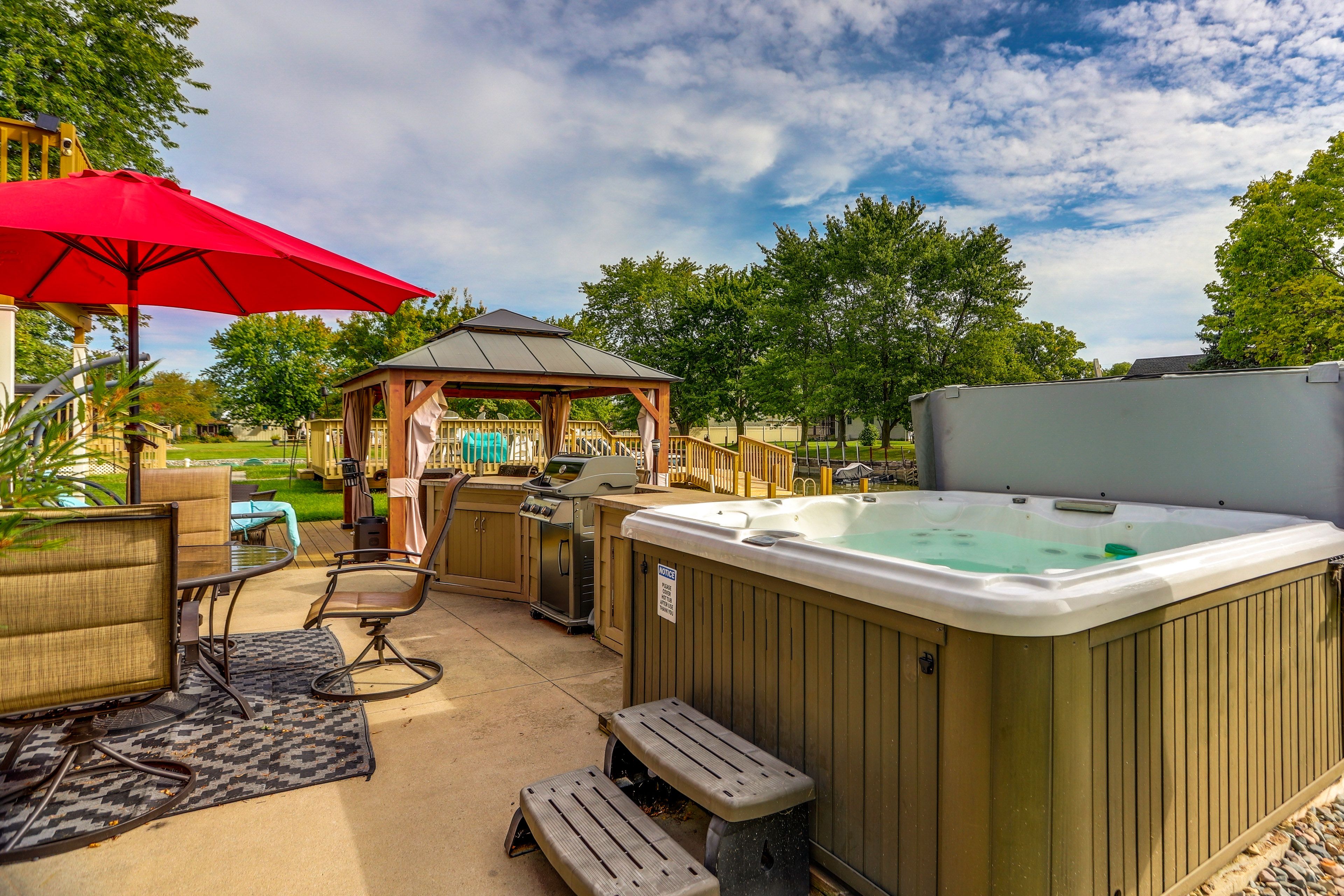 Lower-Level Patio & Deck | Private Hot Tub | Outdoor Dining | Gas Grill