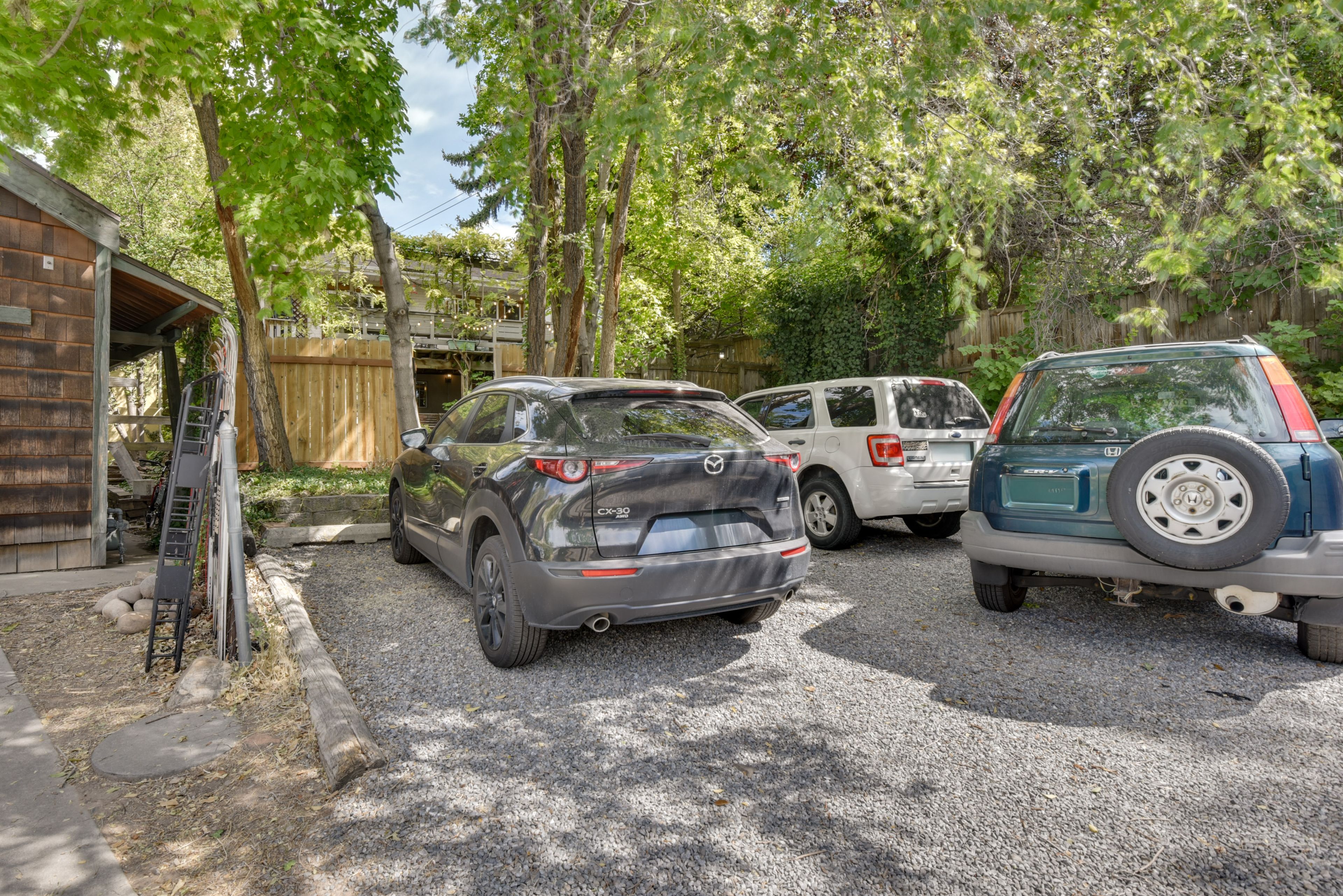 Gravel Driveway (3 Vehicles) | Street Parking (1 Pass Provided Upon Request)