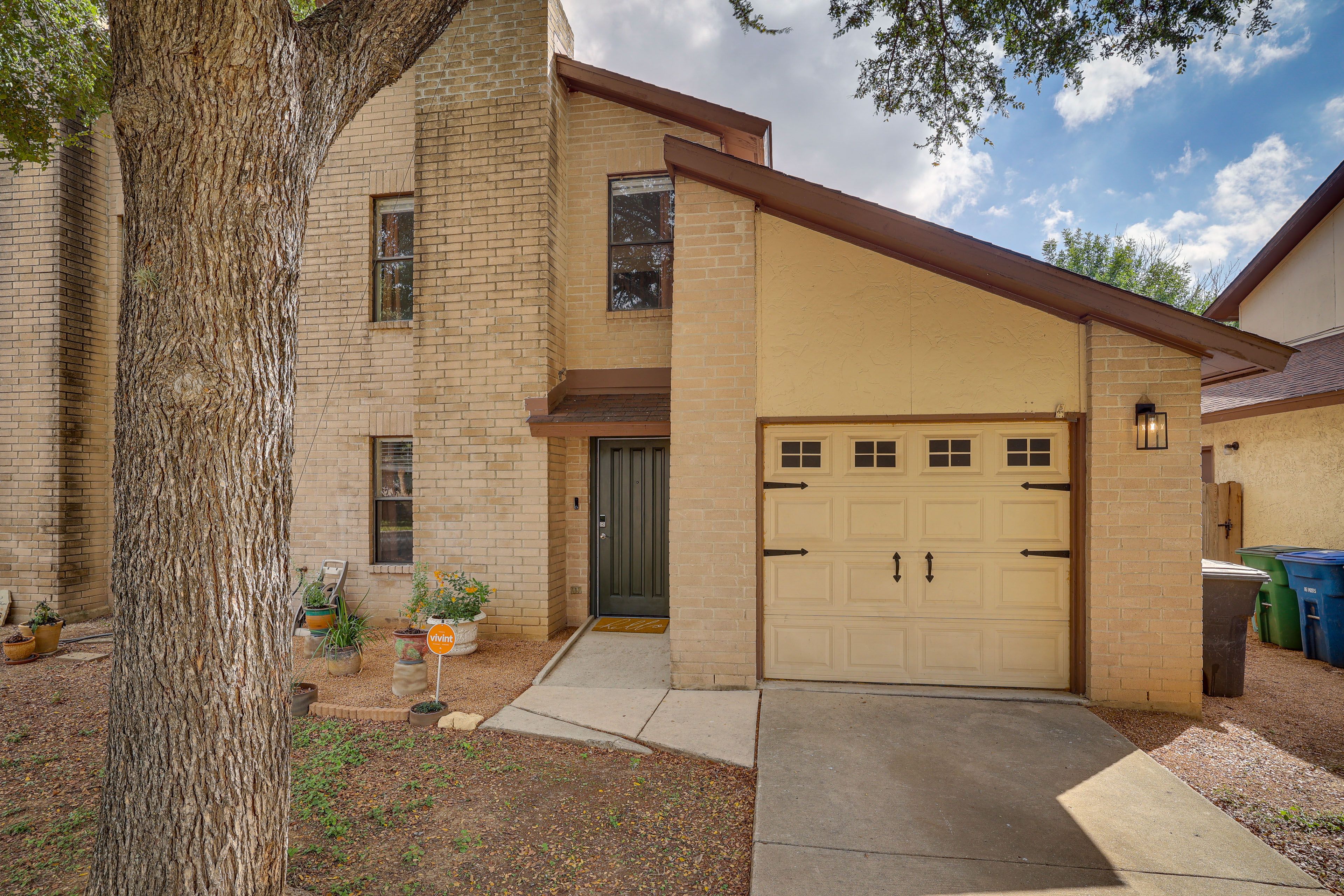 Townhome Exterior | Driveway (2 Vehicles) | Free Street Parking