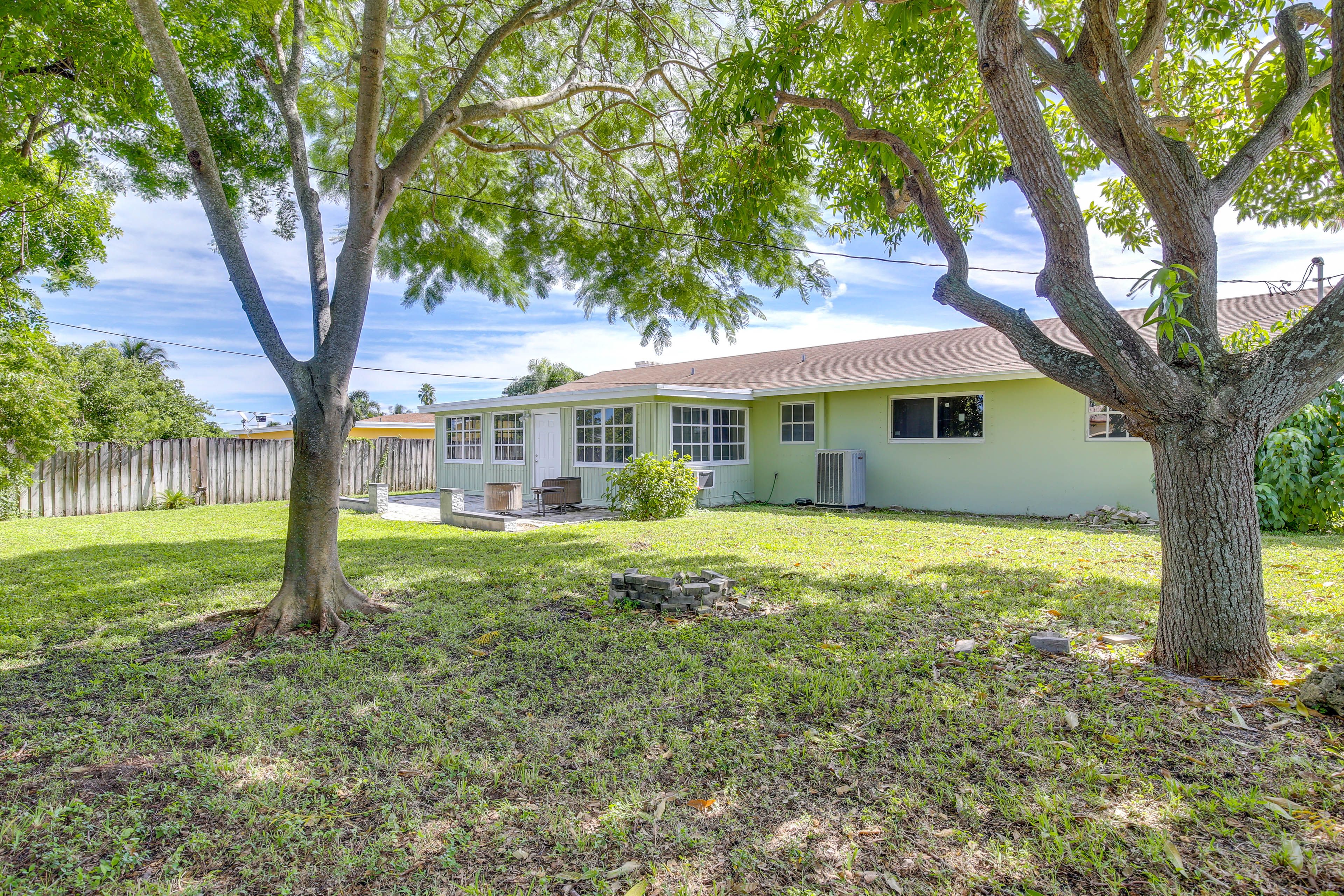 House Exterior | Fenced Backyard | Patio w/ Seating