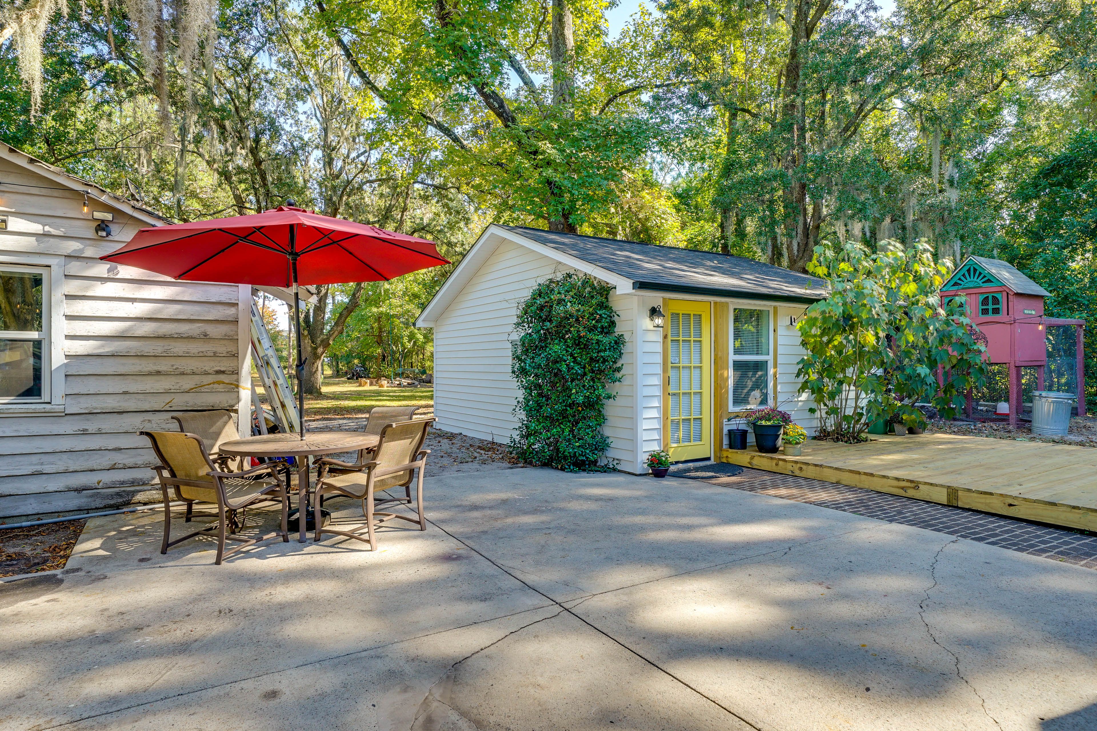 Shared Patio | Driveway (1 Vehicle) | Additional Parking (Grass/Sand Area)