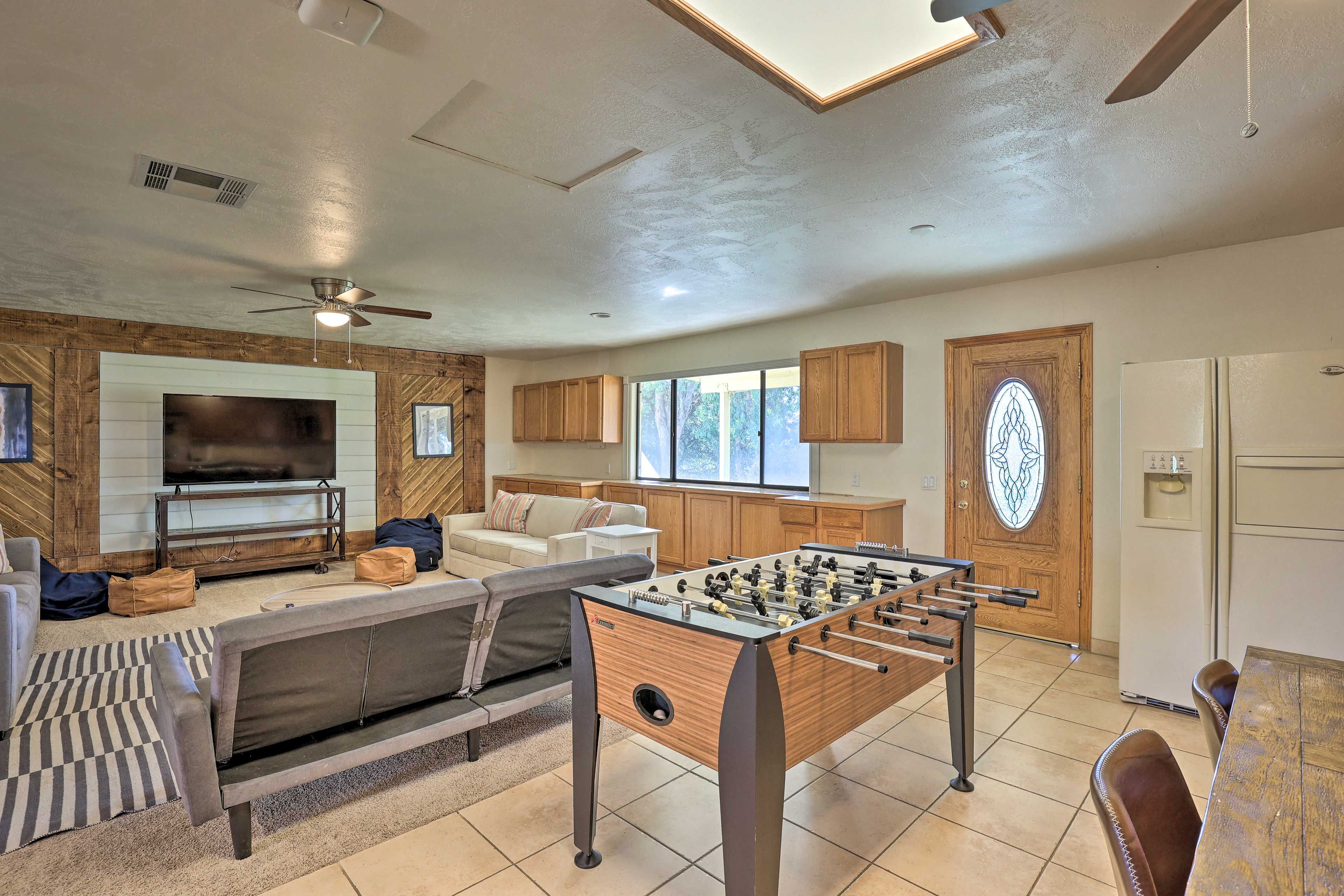 Den | Futon | Smart TV | Foosball Table | Bonus Kitchenette