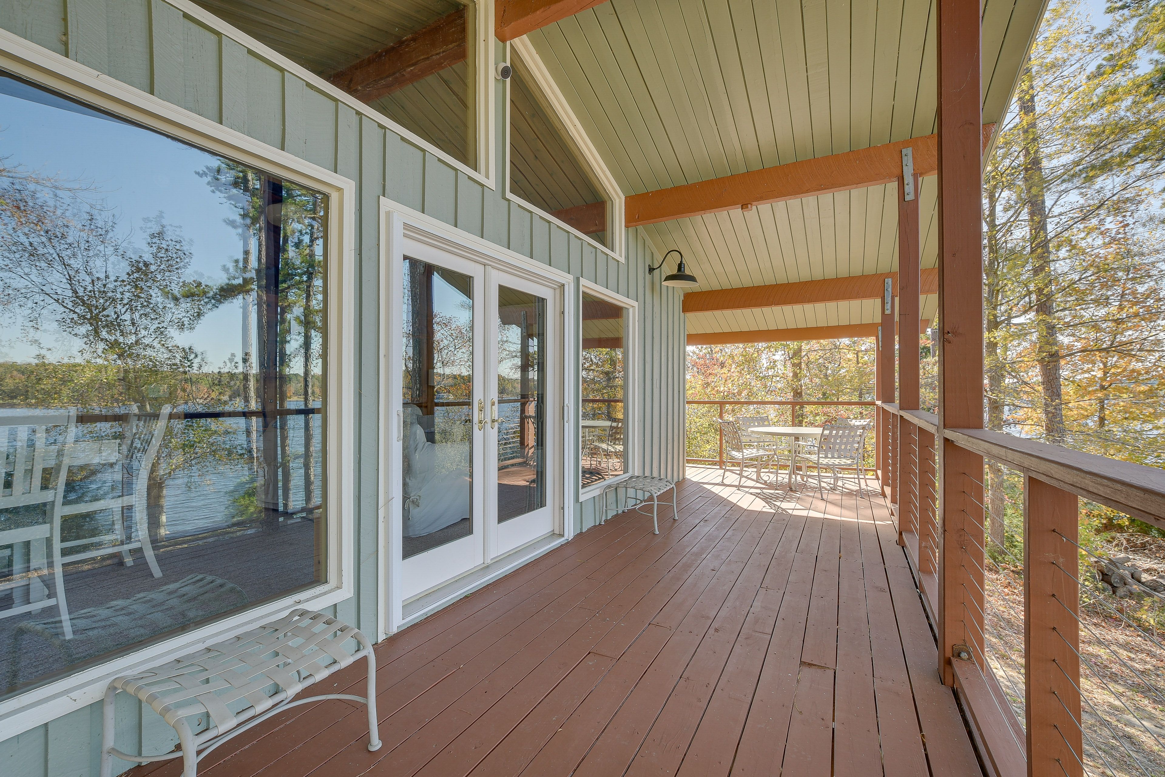 Covered Deck | Lake Views | Outdoor Dining Area