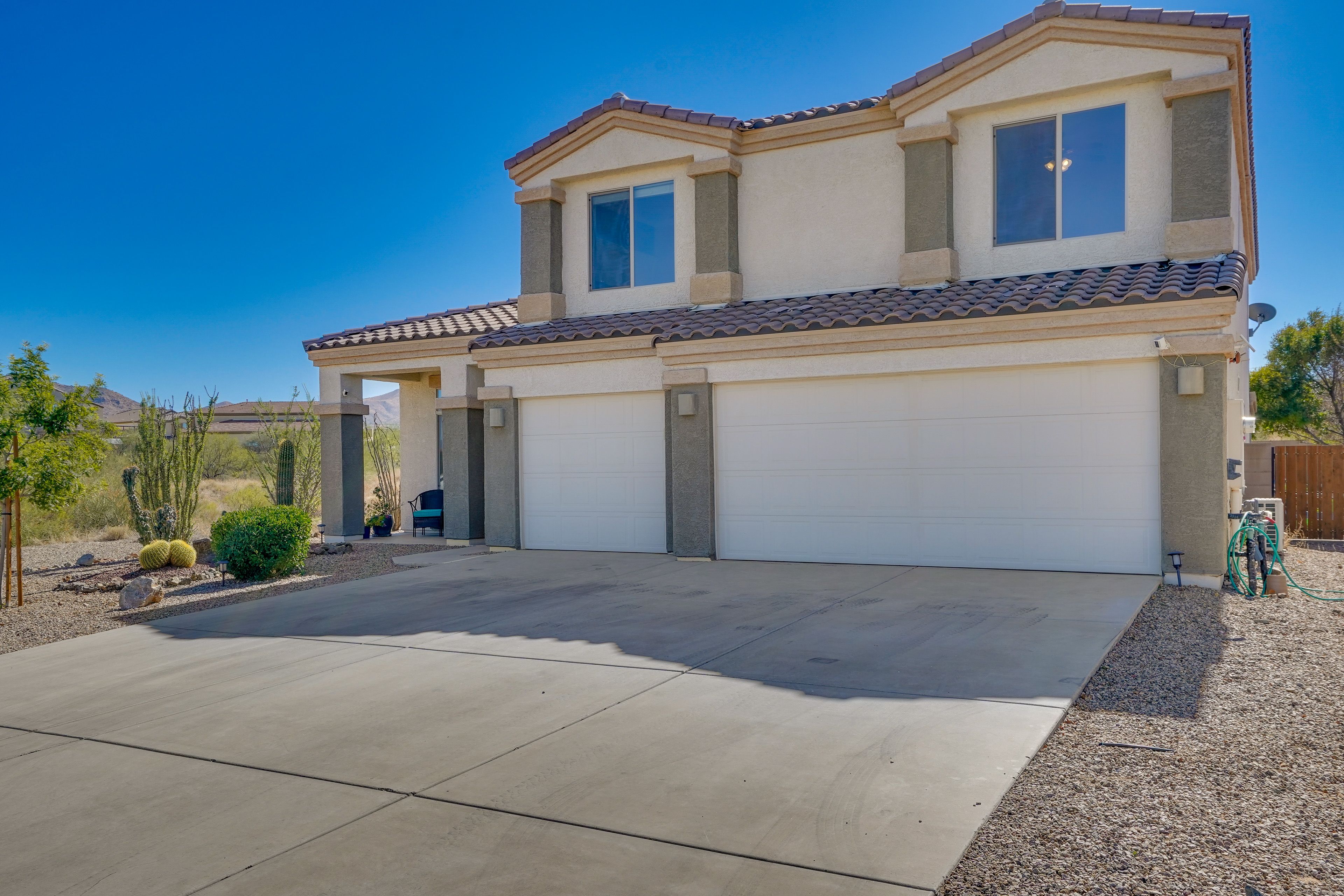 Garage (2 Vehicles) | Driveway (5 Vehicles) | No Asphalt Parking
