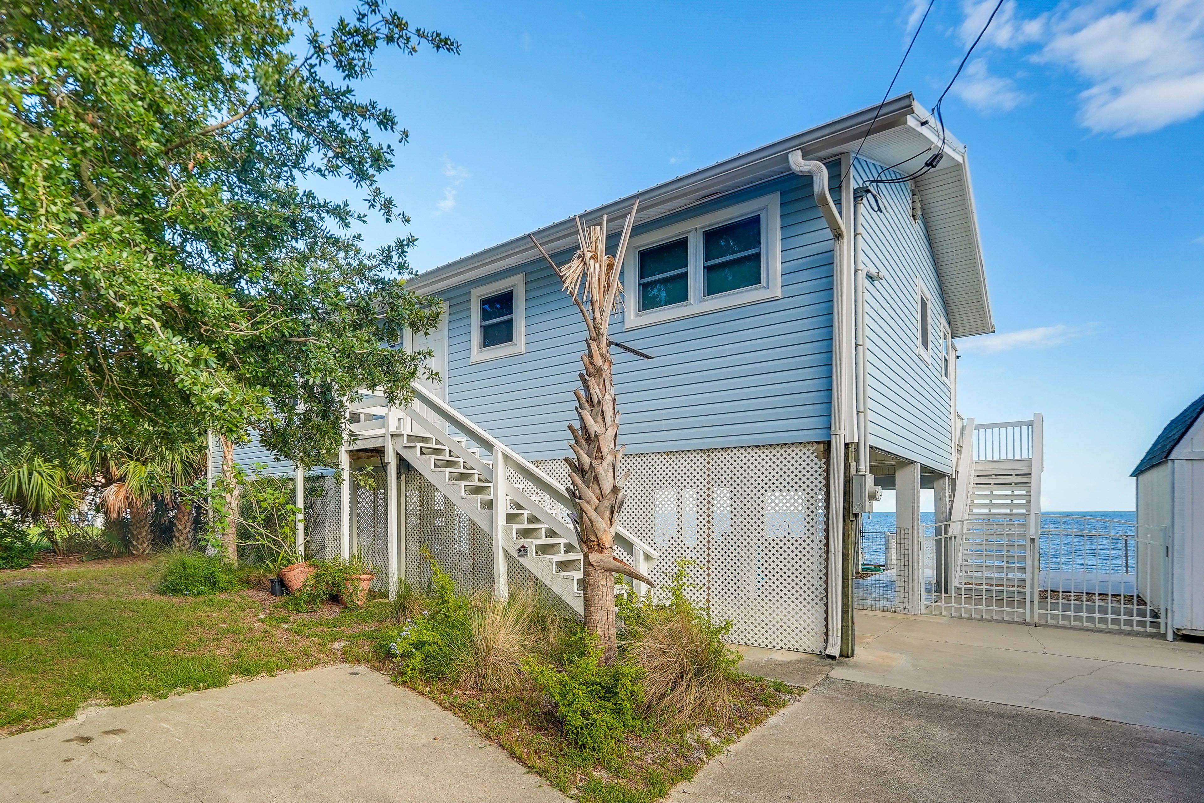 Home Exterior | Parking | Driveway (4 Vehicles) | RV/Trailer Parking Allowed
