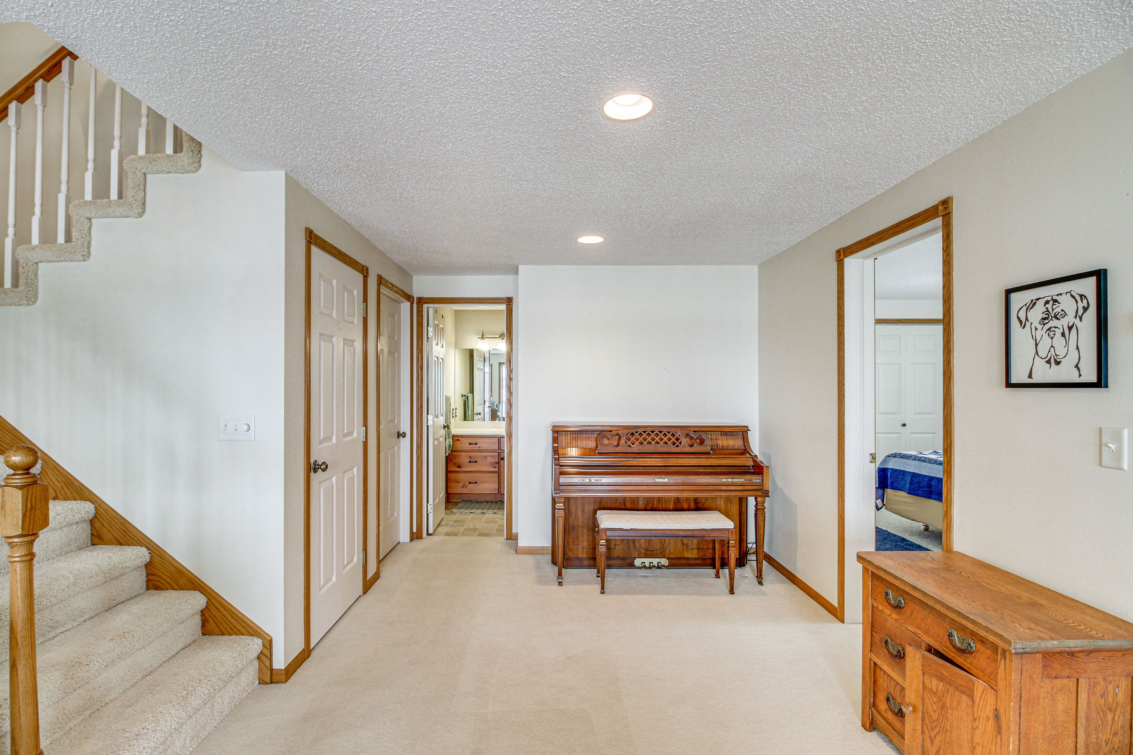 Den | Lower Level | Piano | Dining Table
