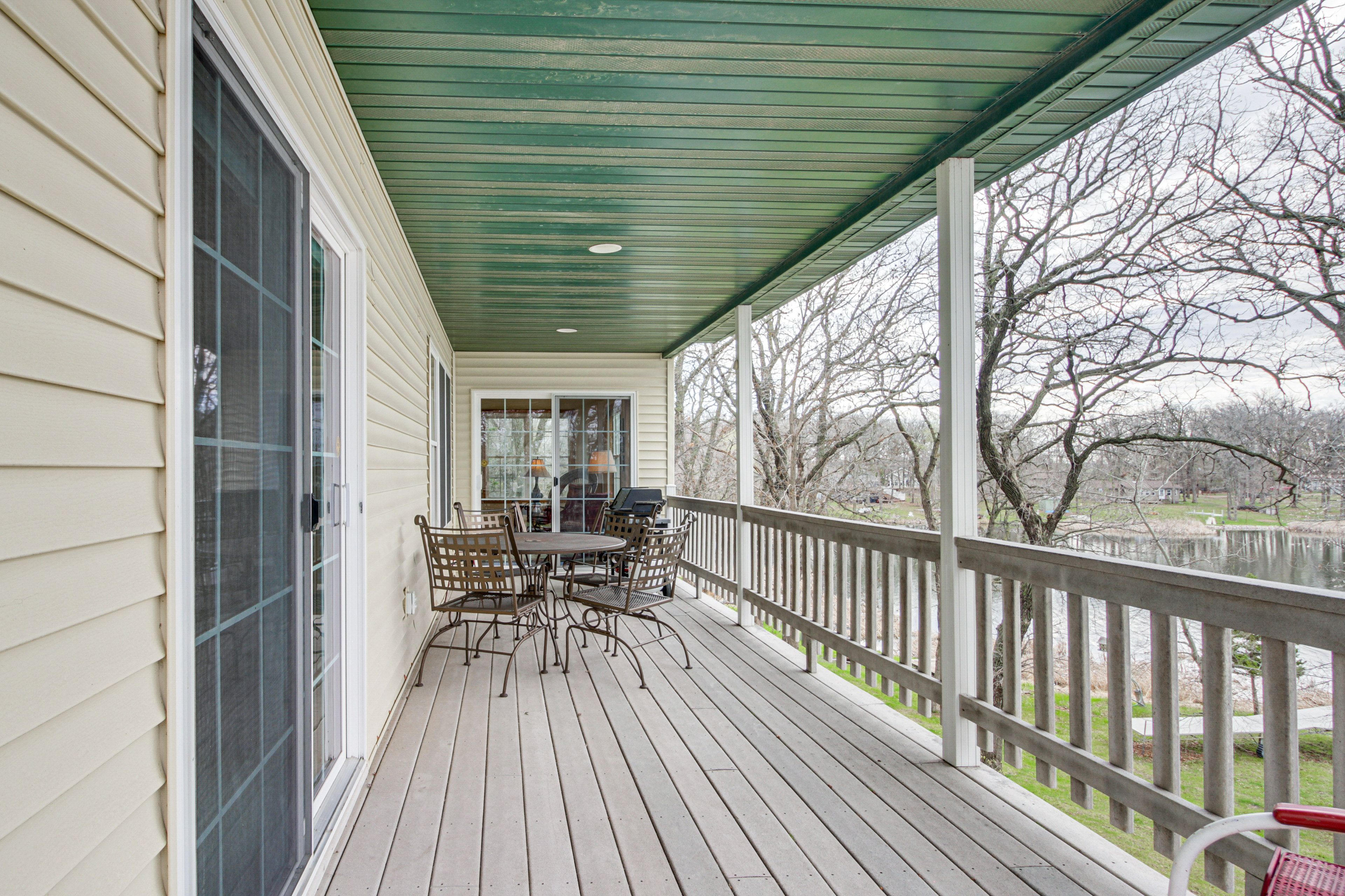 Upper-Level Porch | Gas Grill | Lakefront View