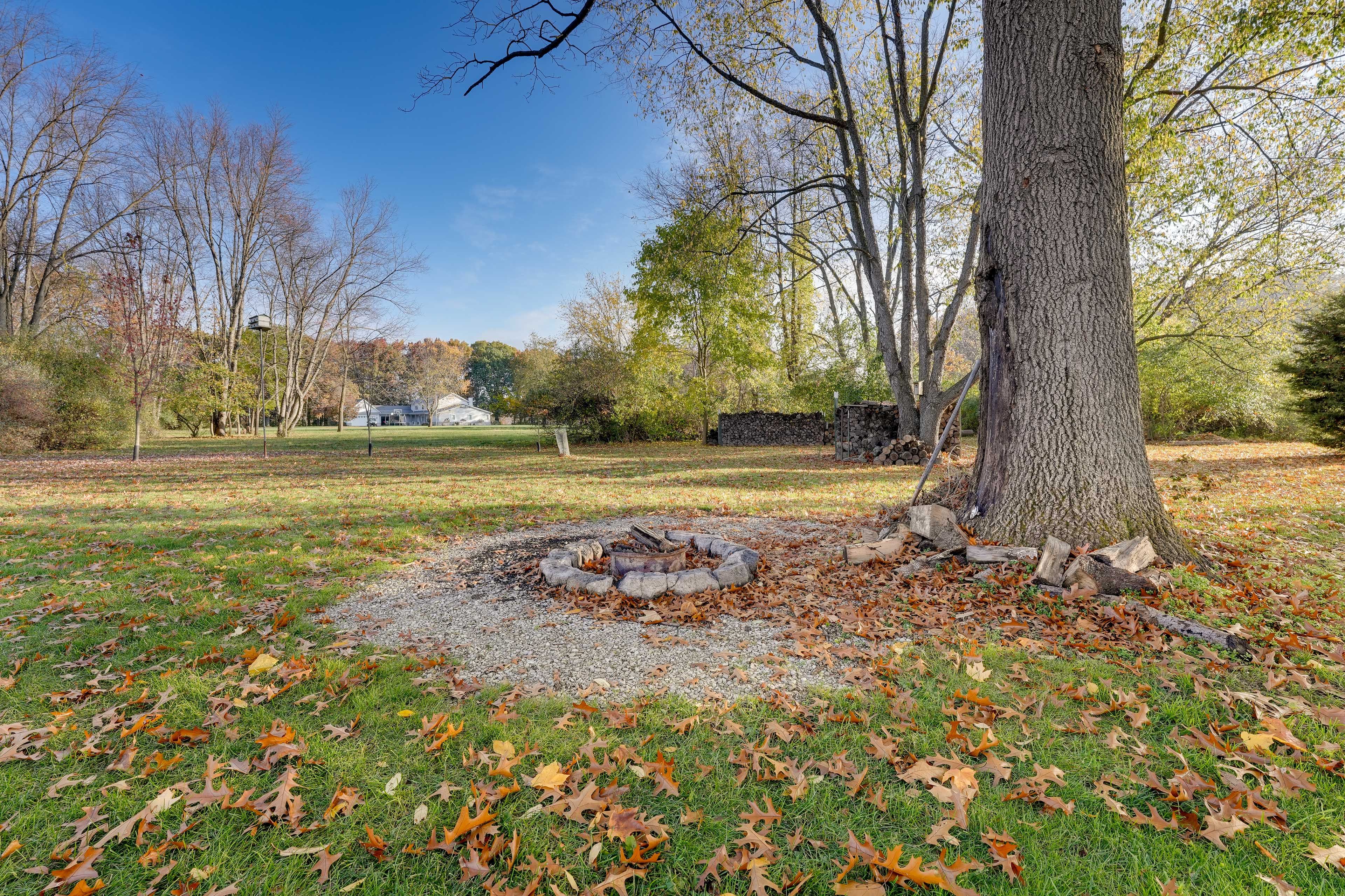 Apartment Exterior | Wood-Burning Fire Pit | Private Yard