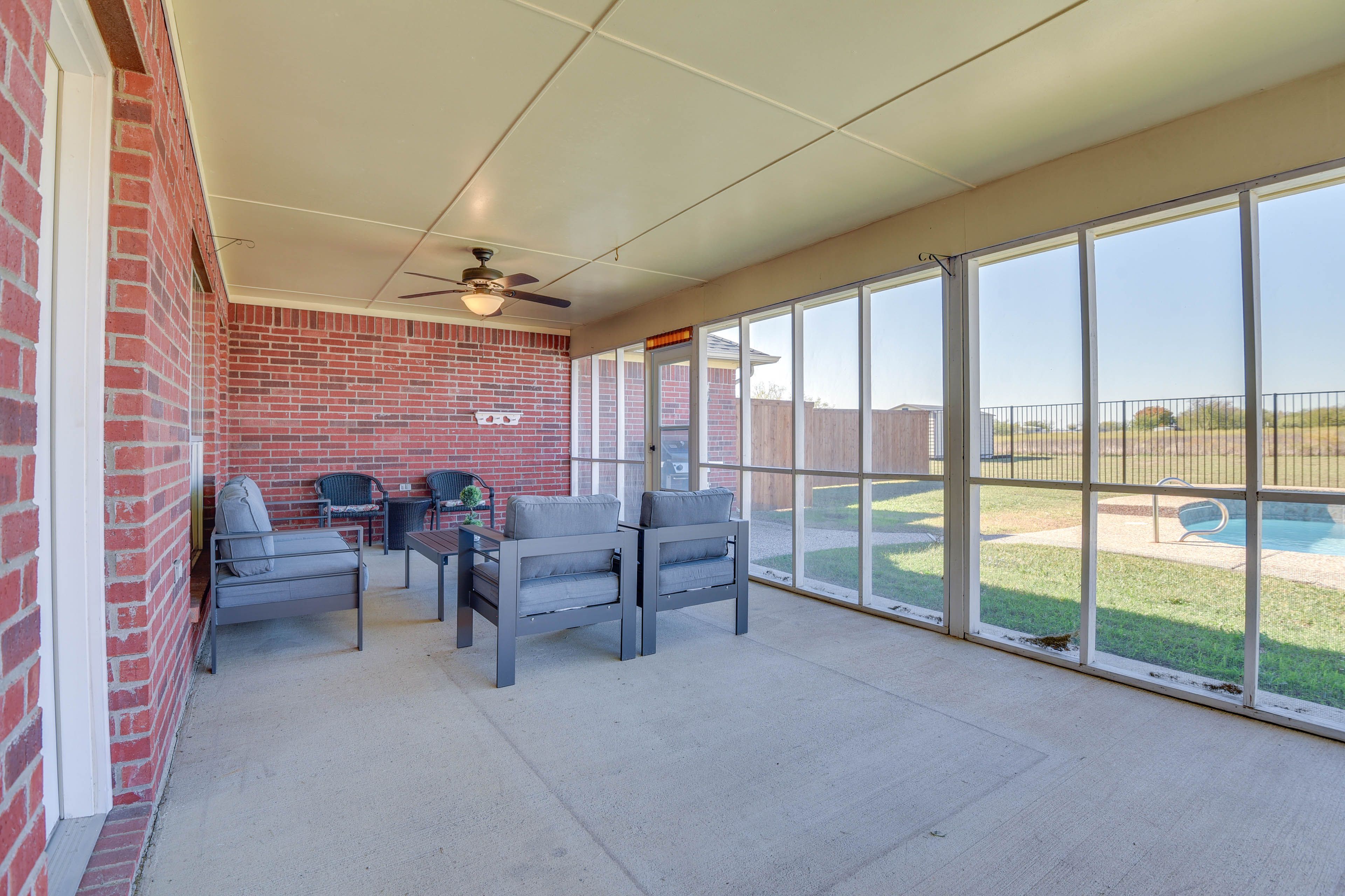 Screened-In Patio | Outdoor Seating & Dining | Gas Grill