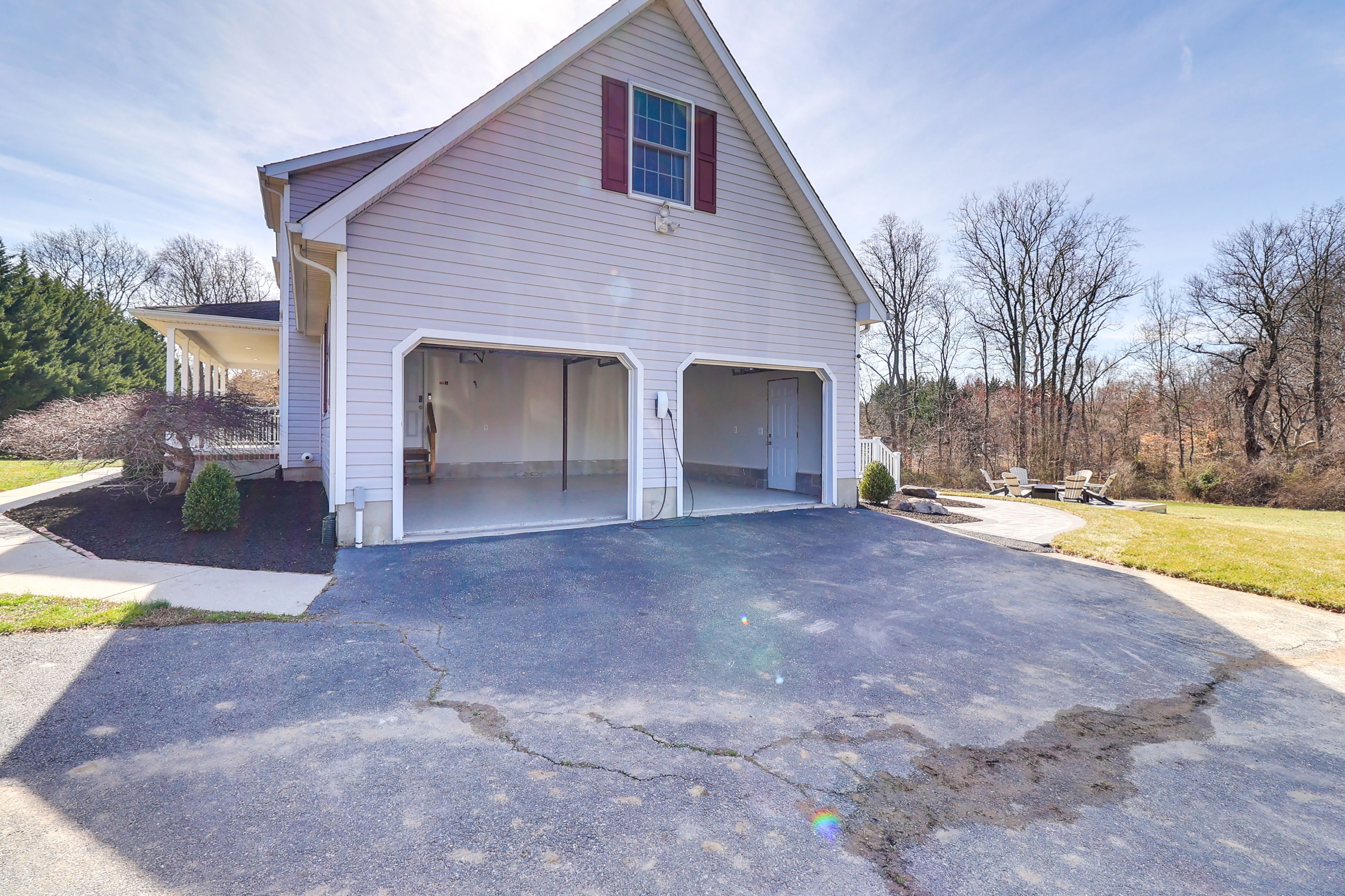 Exterior | Garage (2 Vehicles) | Driveway (8 Vehicles) | EV Charger