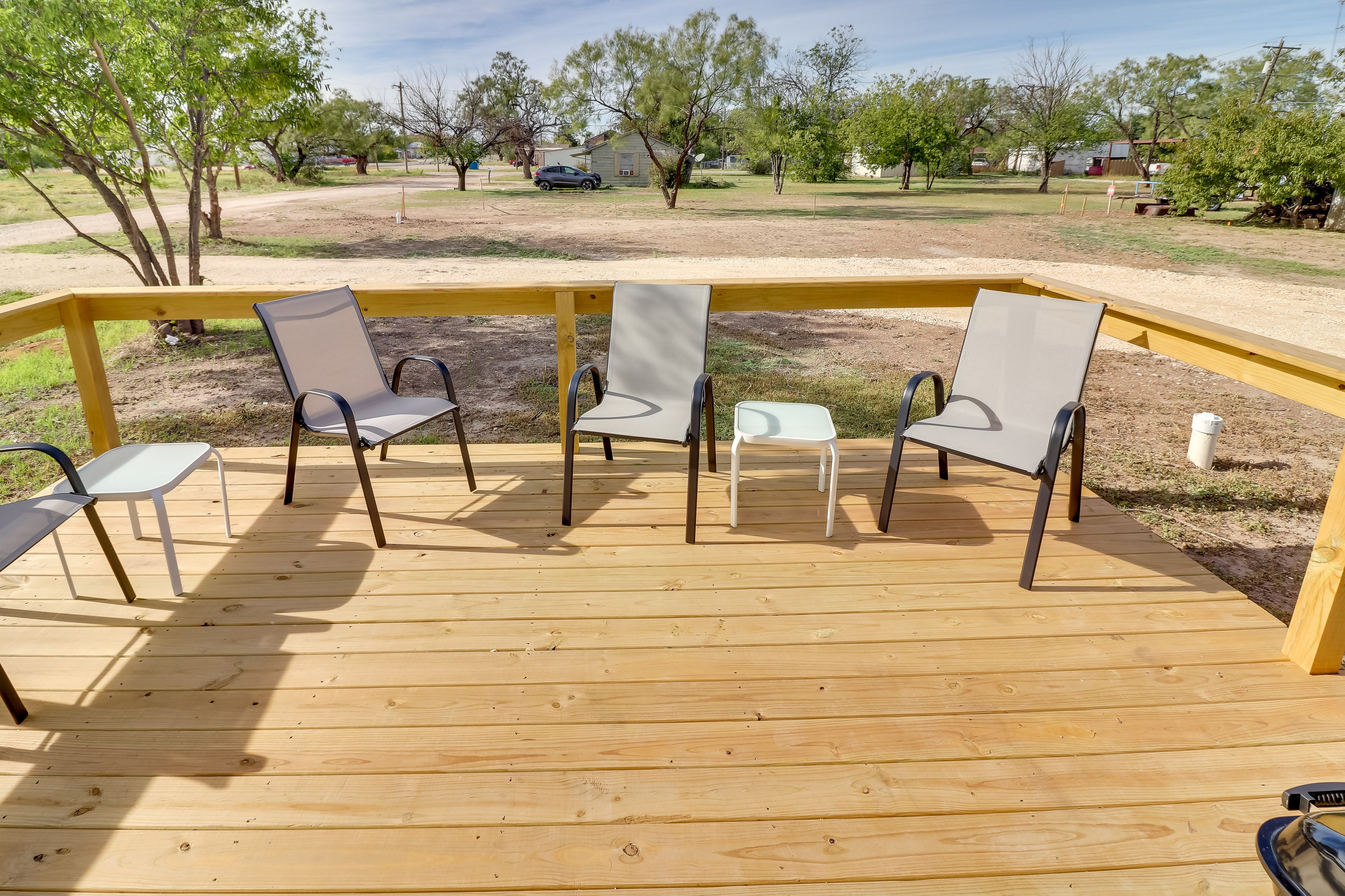 House Exterior | Furnished Deck | Charcoal Grill