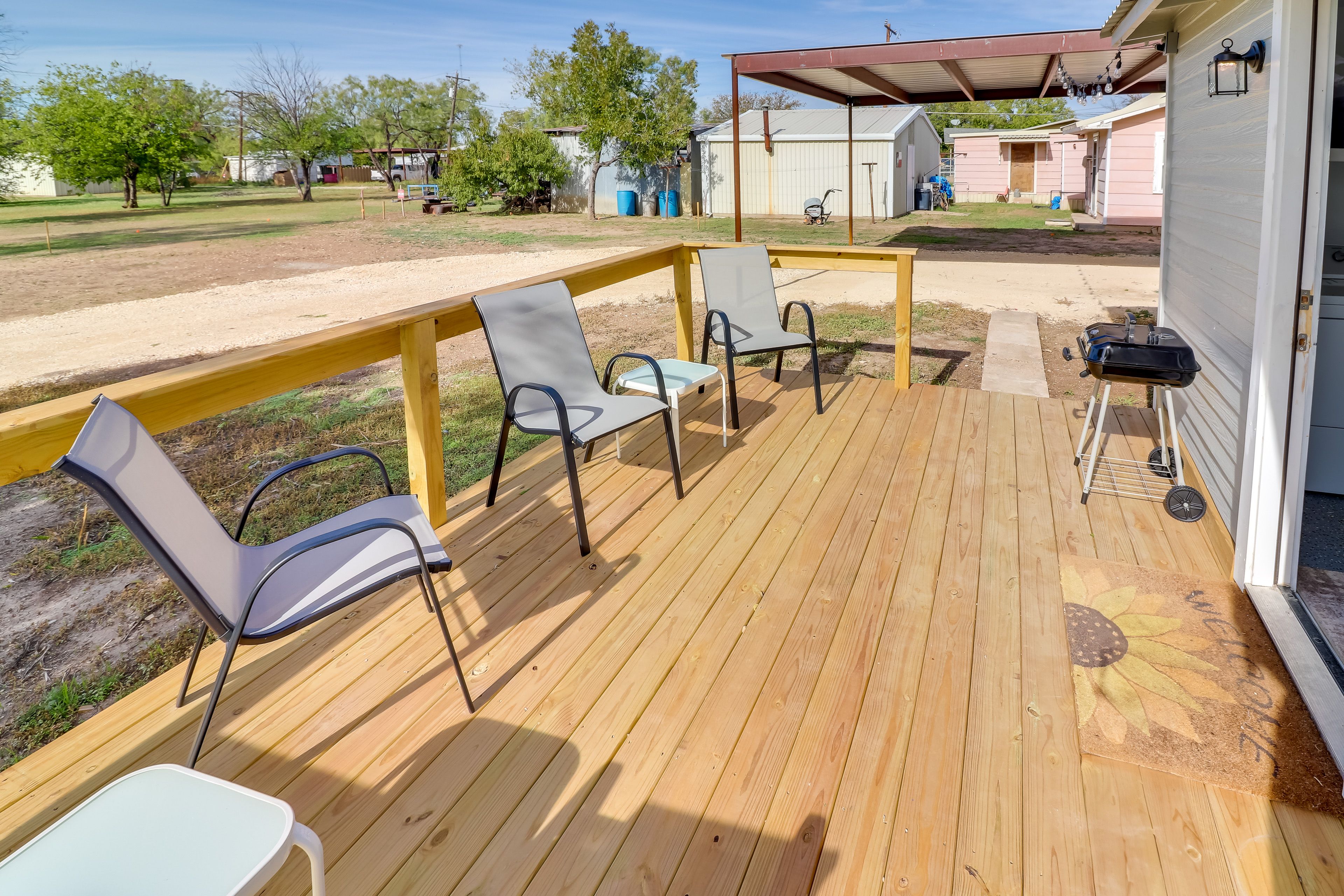 House Exterior | Furnished Deck | Charcoal Grill