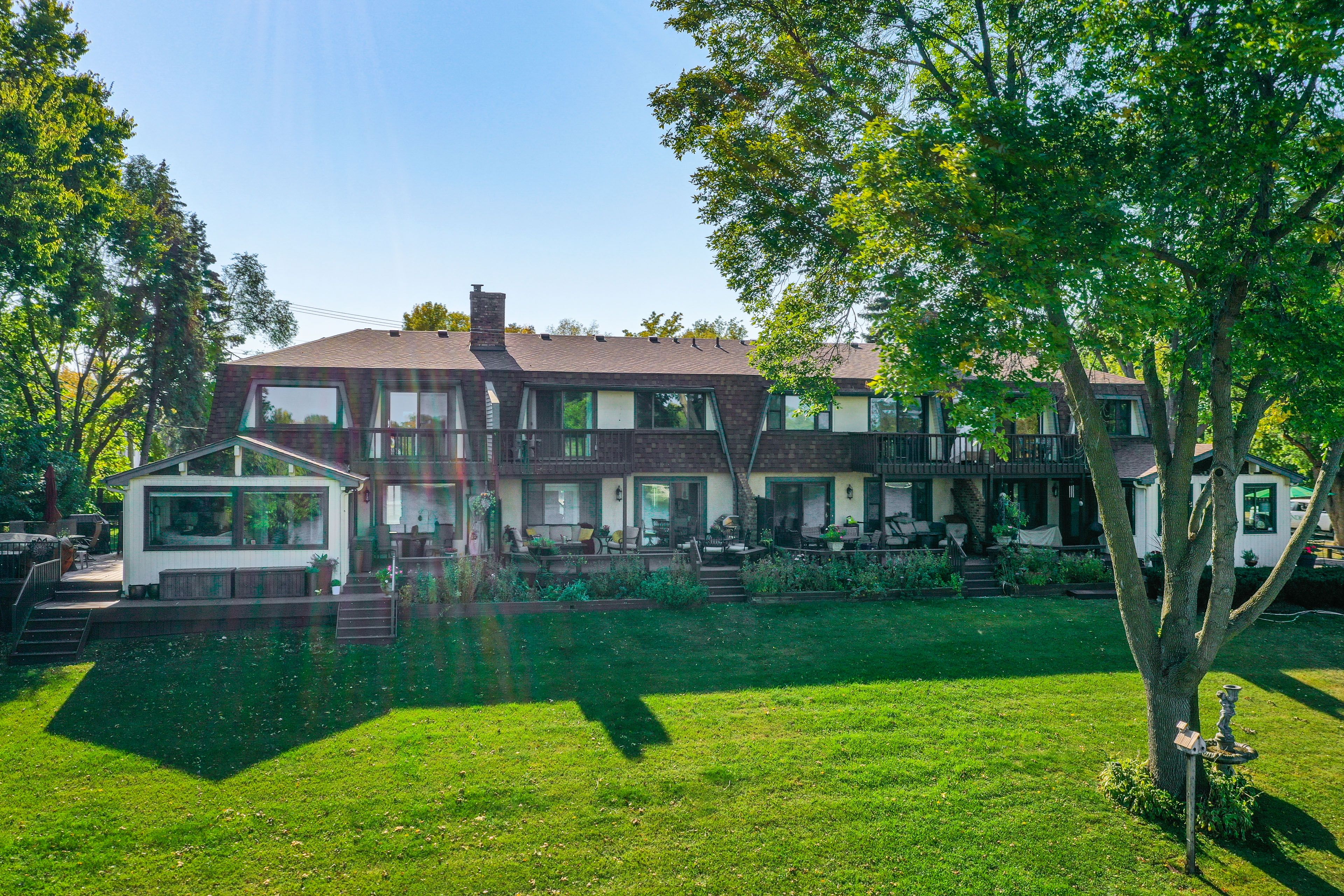 Rear Exterior | Shared Yard | Access to Riverfront Trail