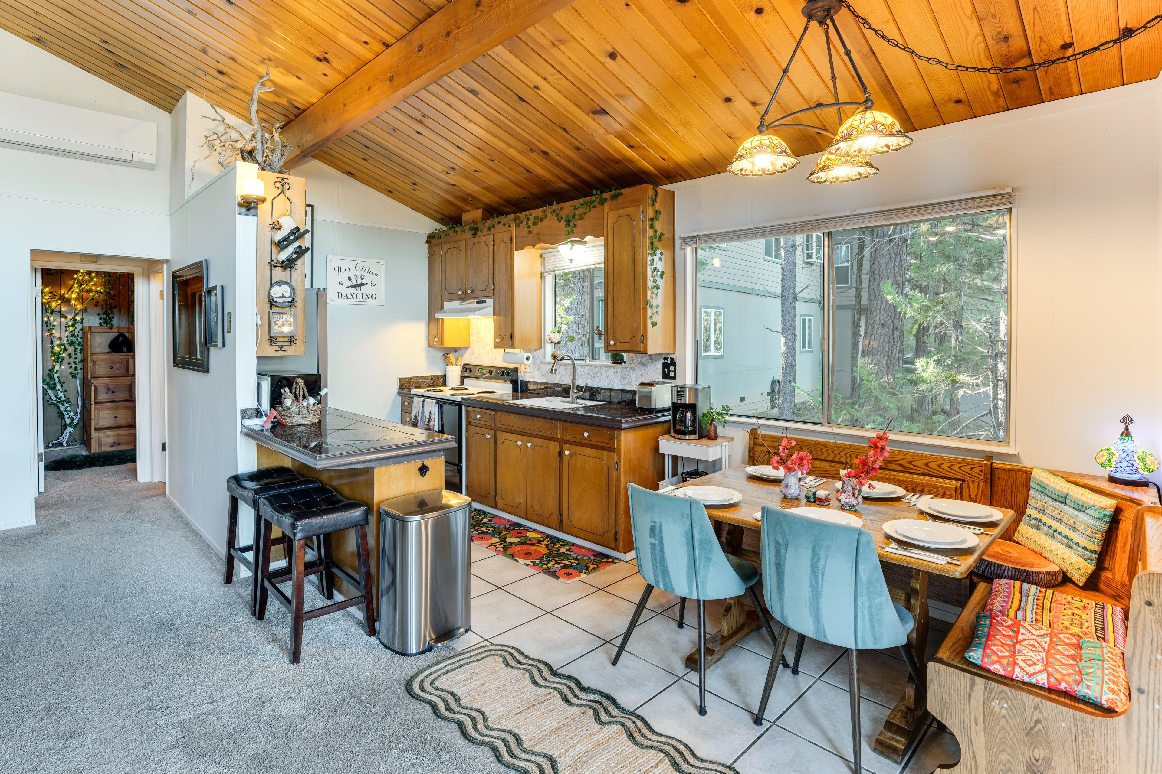 Kitchen & Dining Area | 2-Story Cabin | Open Floor Plan