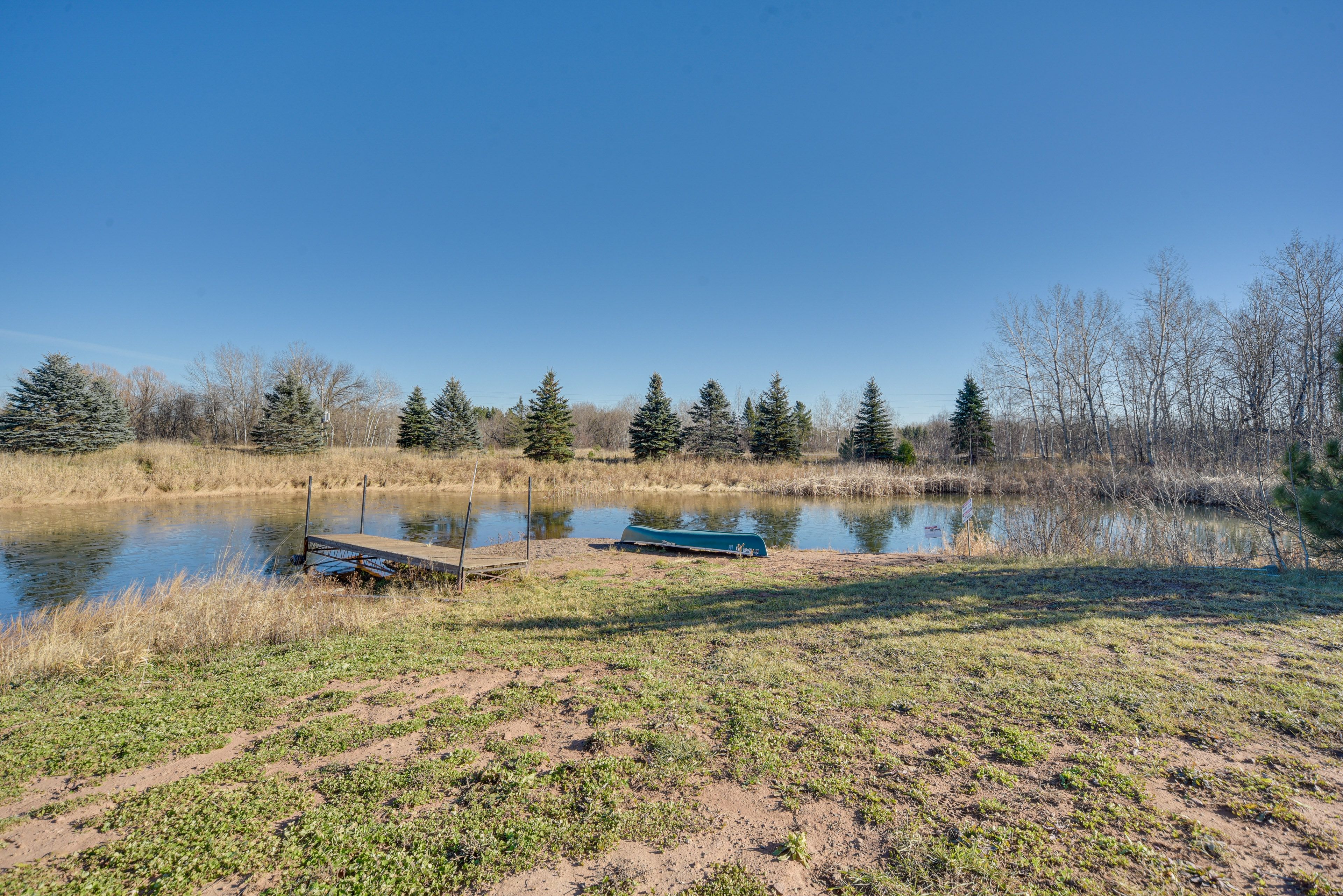 Private Pond | Canoe