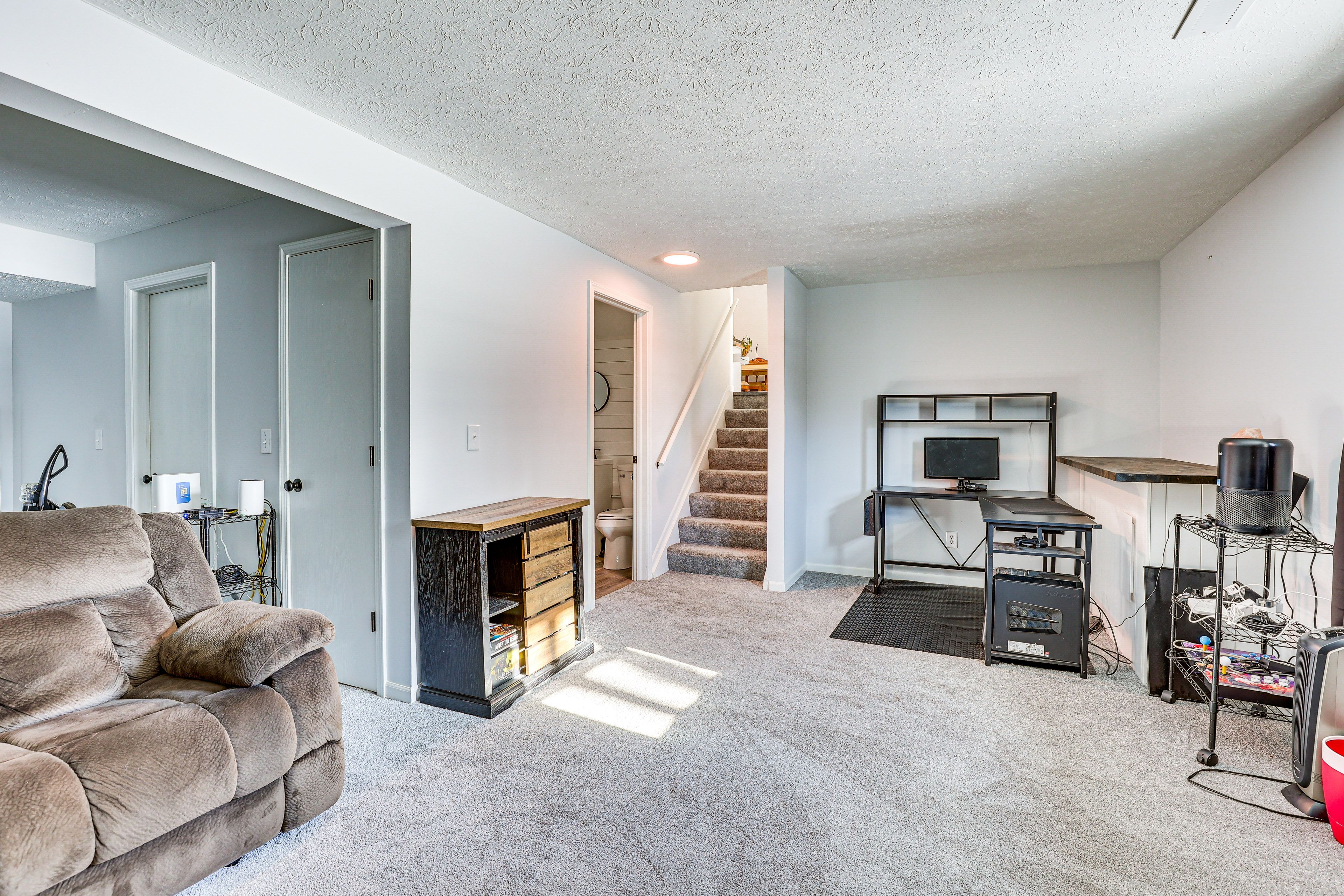 Family Room | Projector | Fireplace | Board Games | Workstation | 1st Floor