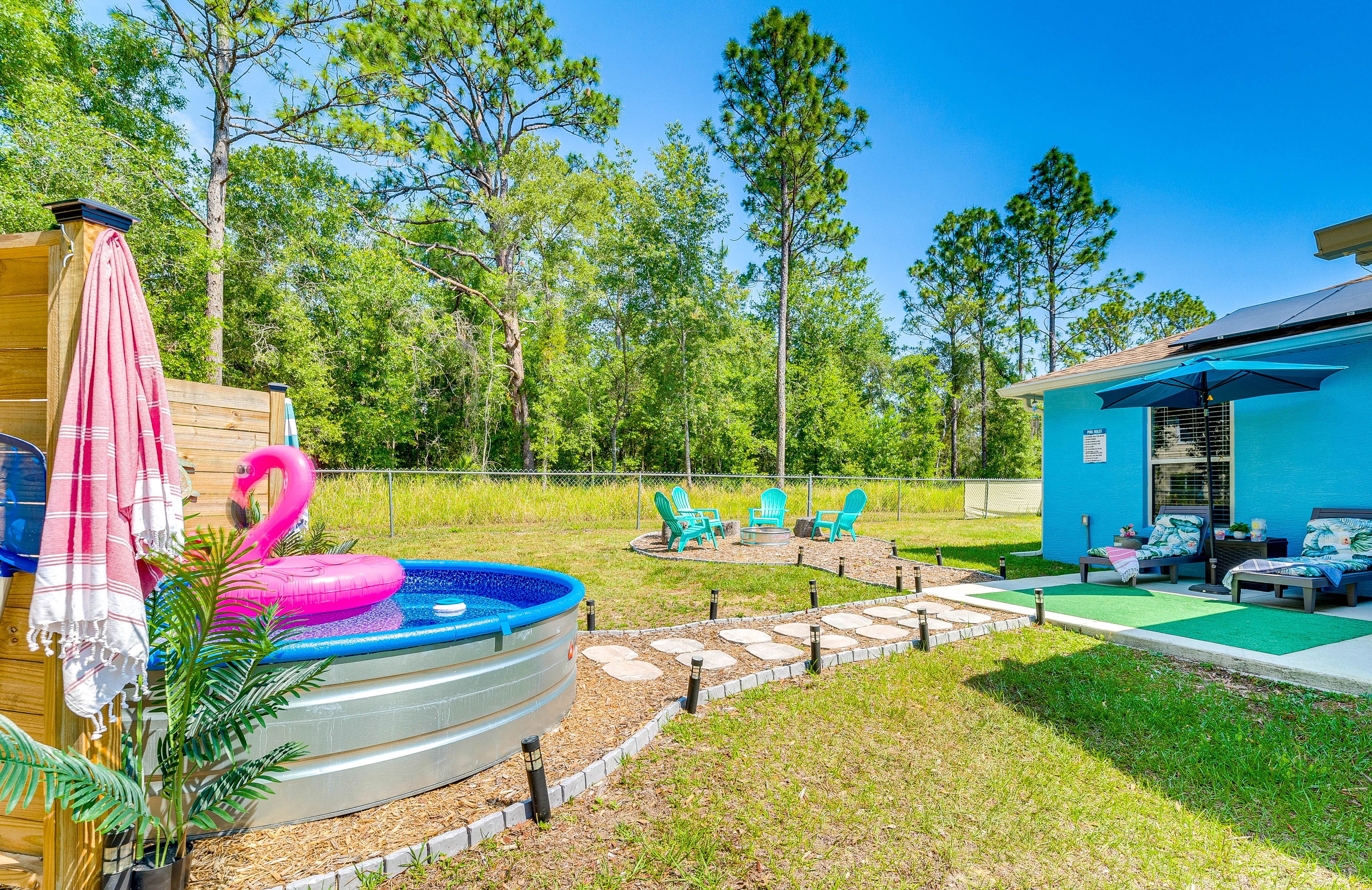 Backyard | Seasonal Cowboy Pool (Open May-Sept Only) | Fire Pit | Patio Seating