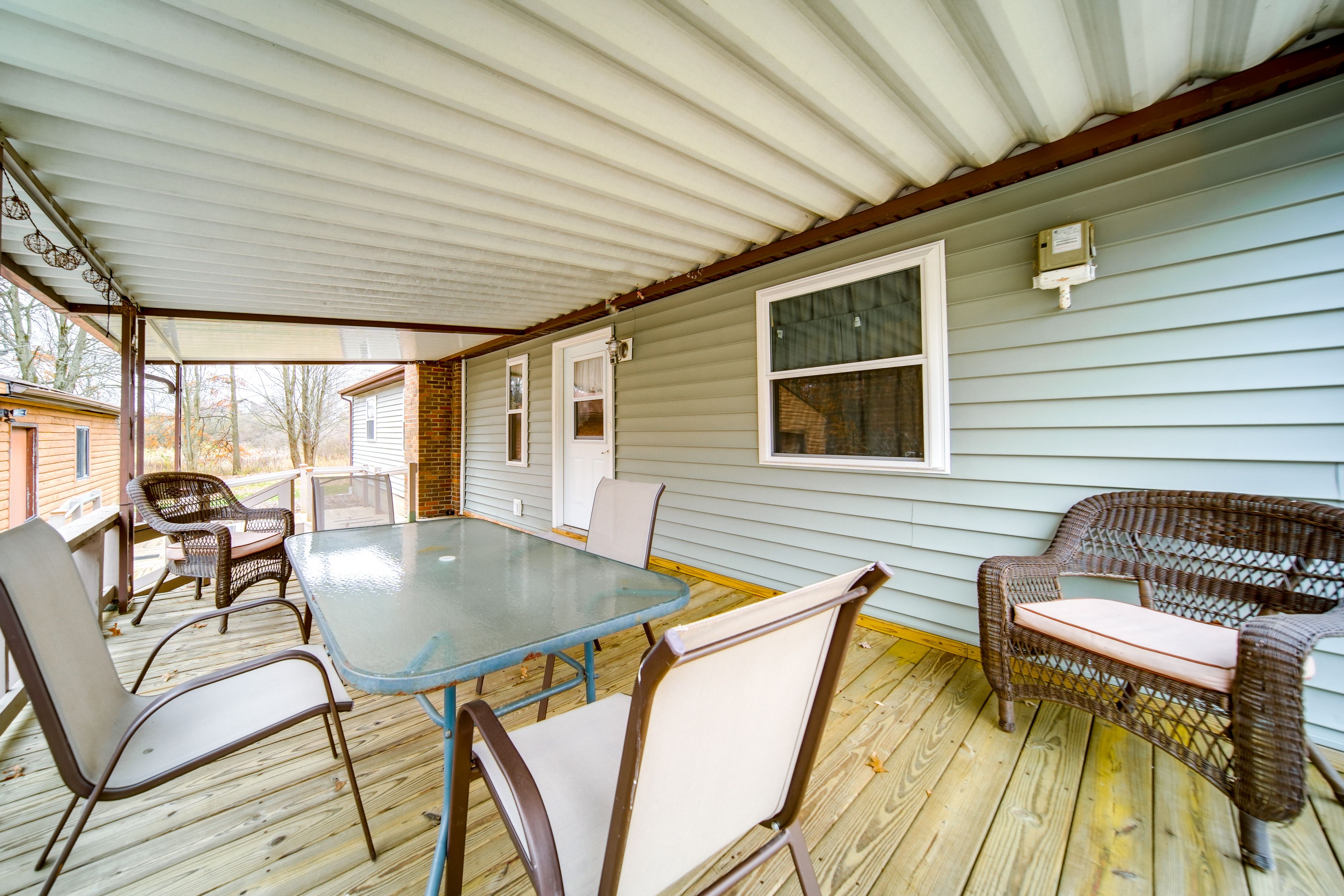 Covered Deck | Dining Area | ~11 Mi to Berlin Lake