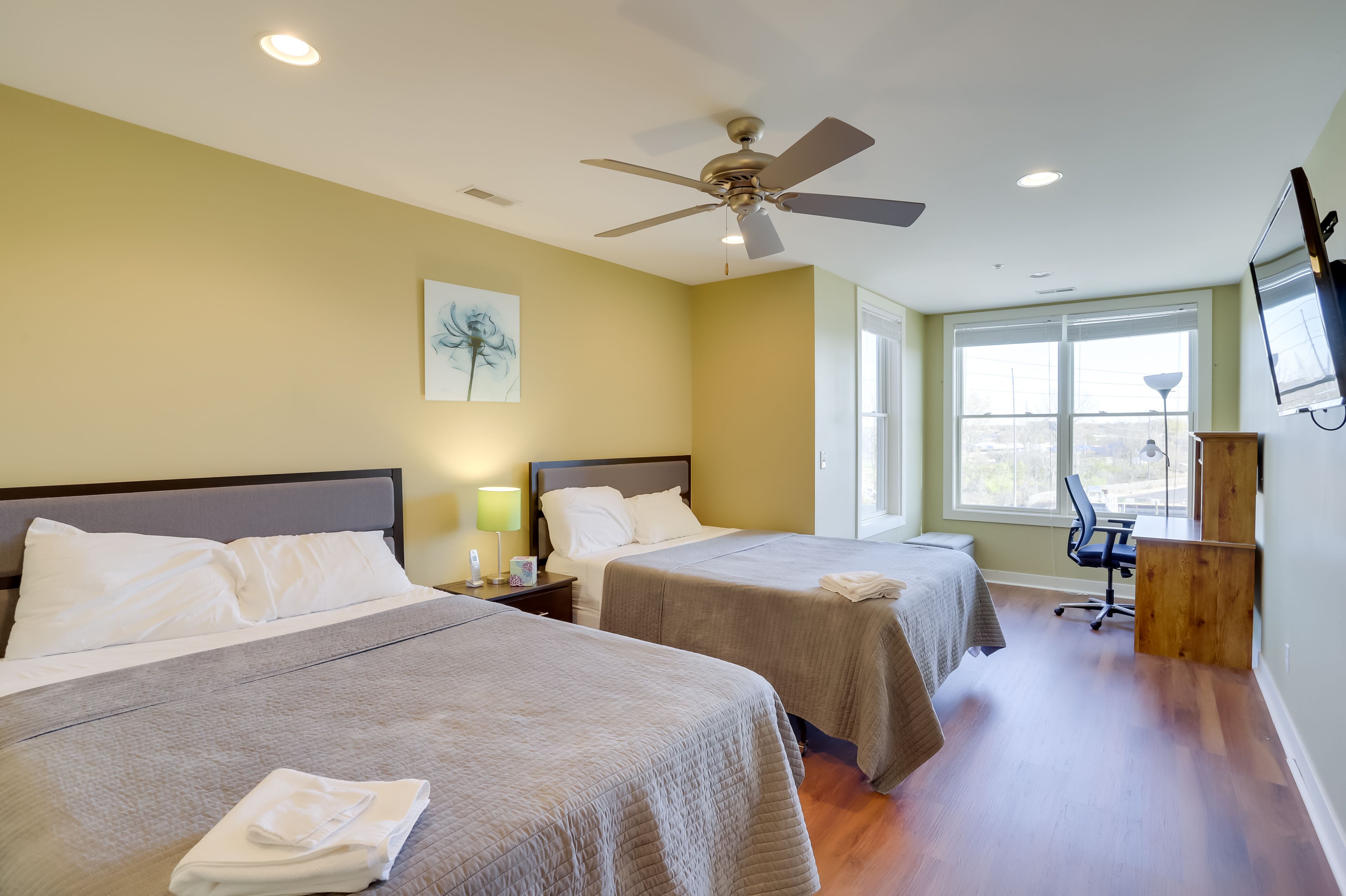 Bedroom 1 | 2 Queen Beds | Smart TV | Desk | En-Suite Bathroom