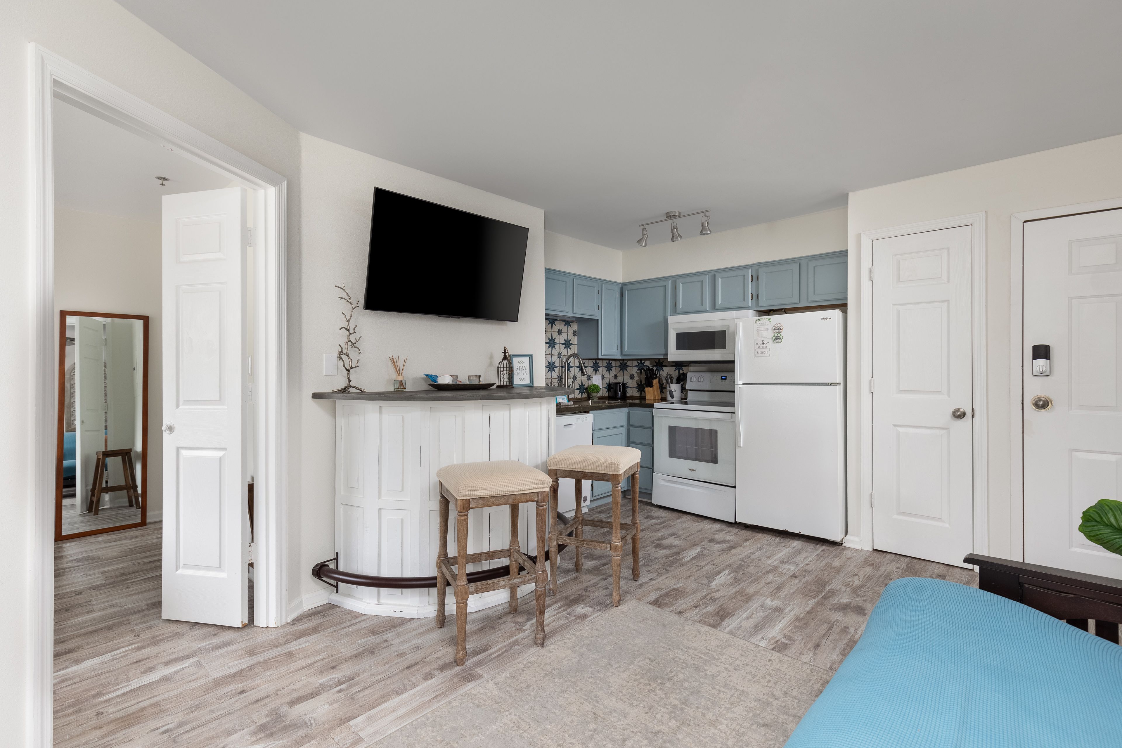 Living Area | Queen Futon | Smart TV | Single-Story Condo