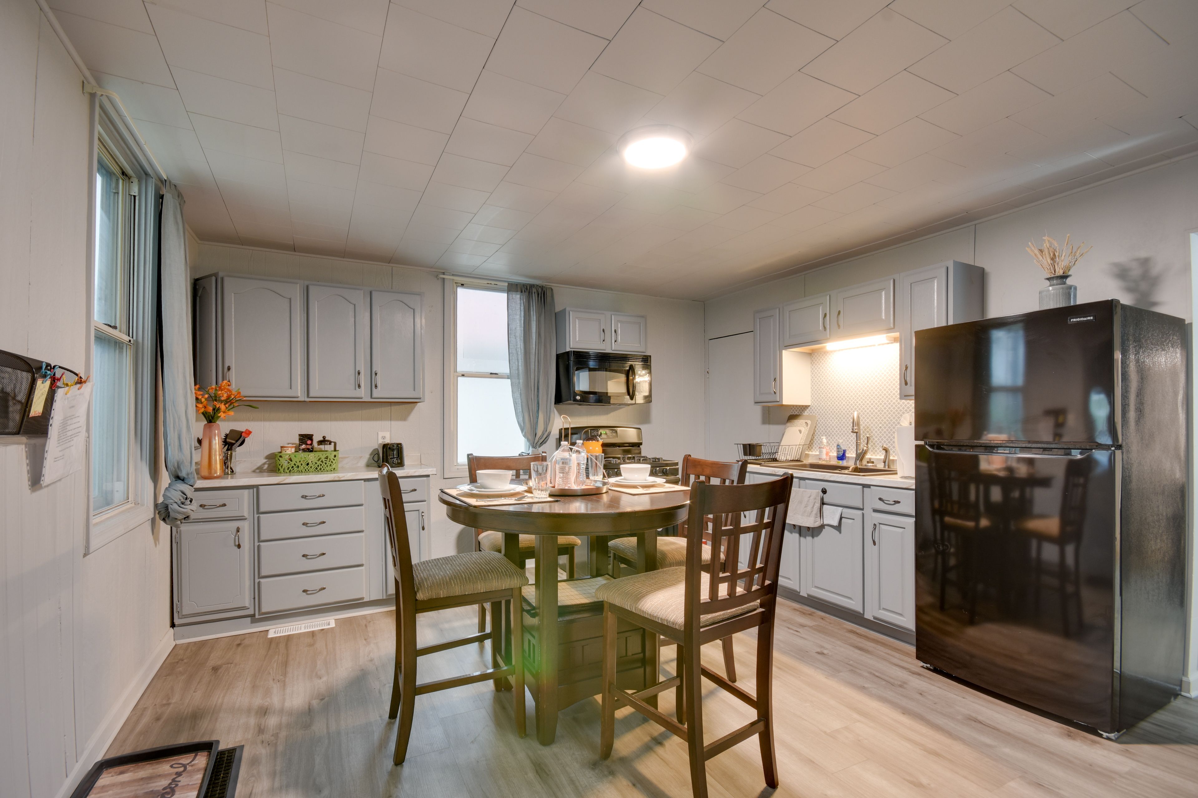 Dining Room | Main Level | 2-Story Home | Dishware & Flatware