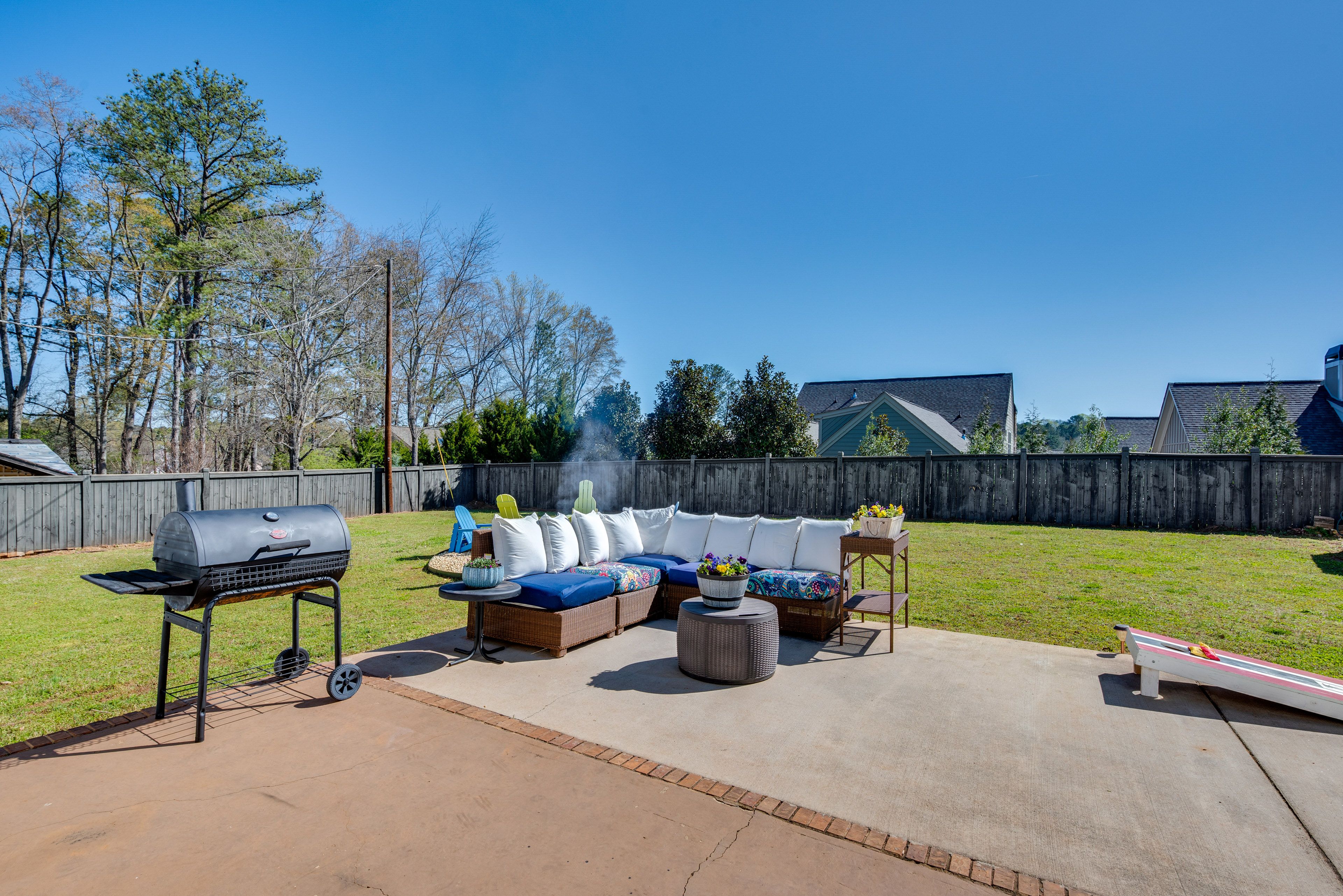 Fenced Backyard | Patio Area | Outdoor Seating | Charcoal Grill