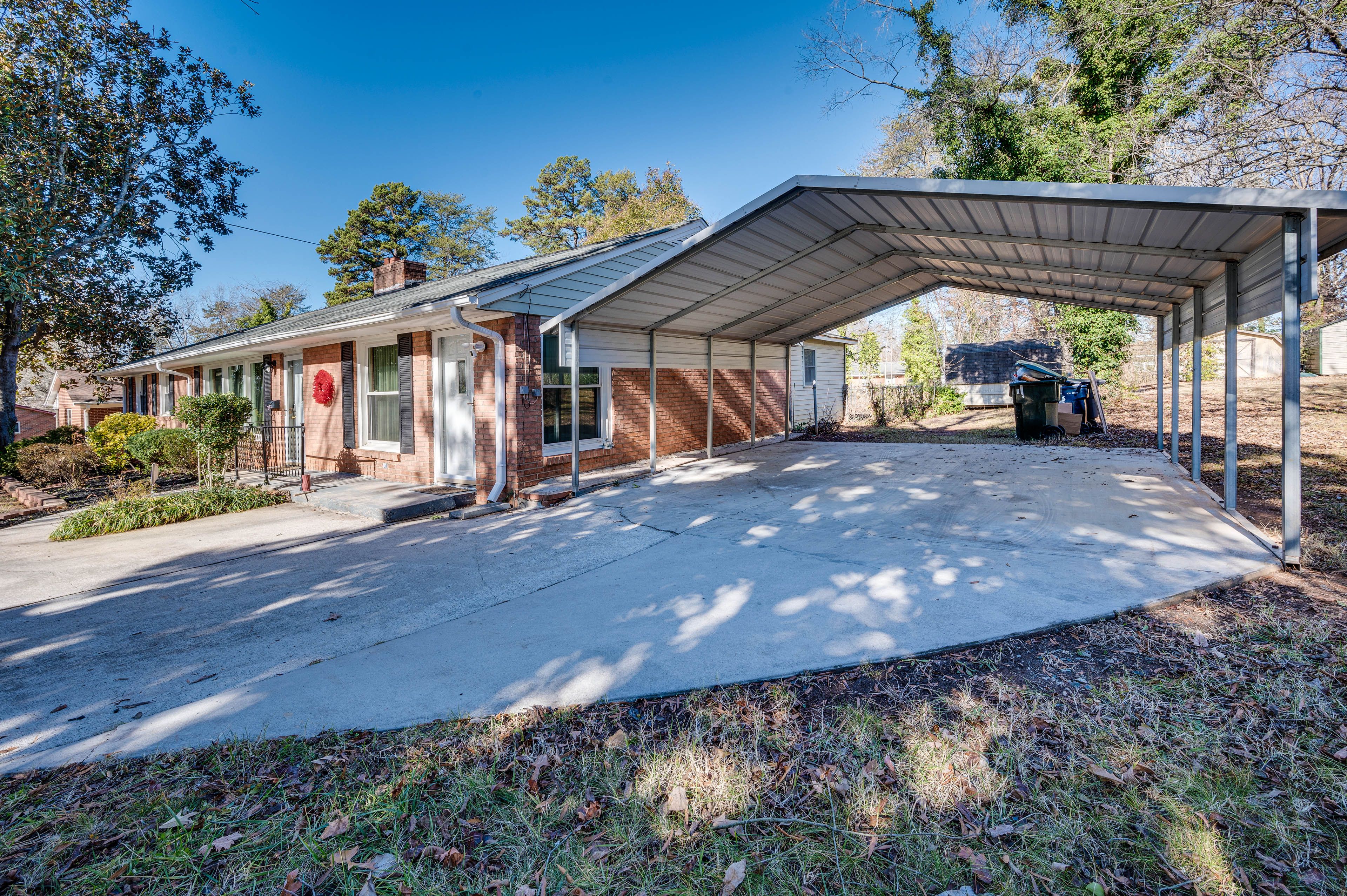 Parking | Front (5 Vehicles) | Carport (2 Vehicles) | Driveway (3 Vehicles)
