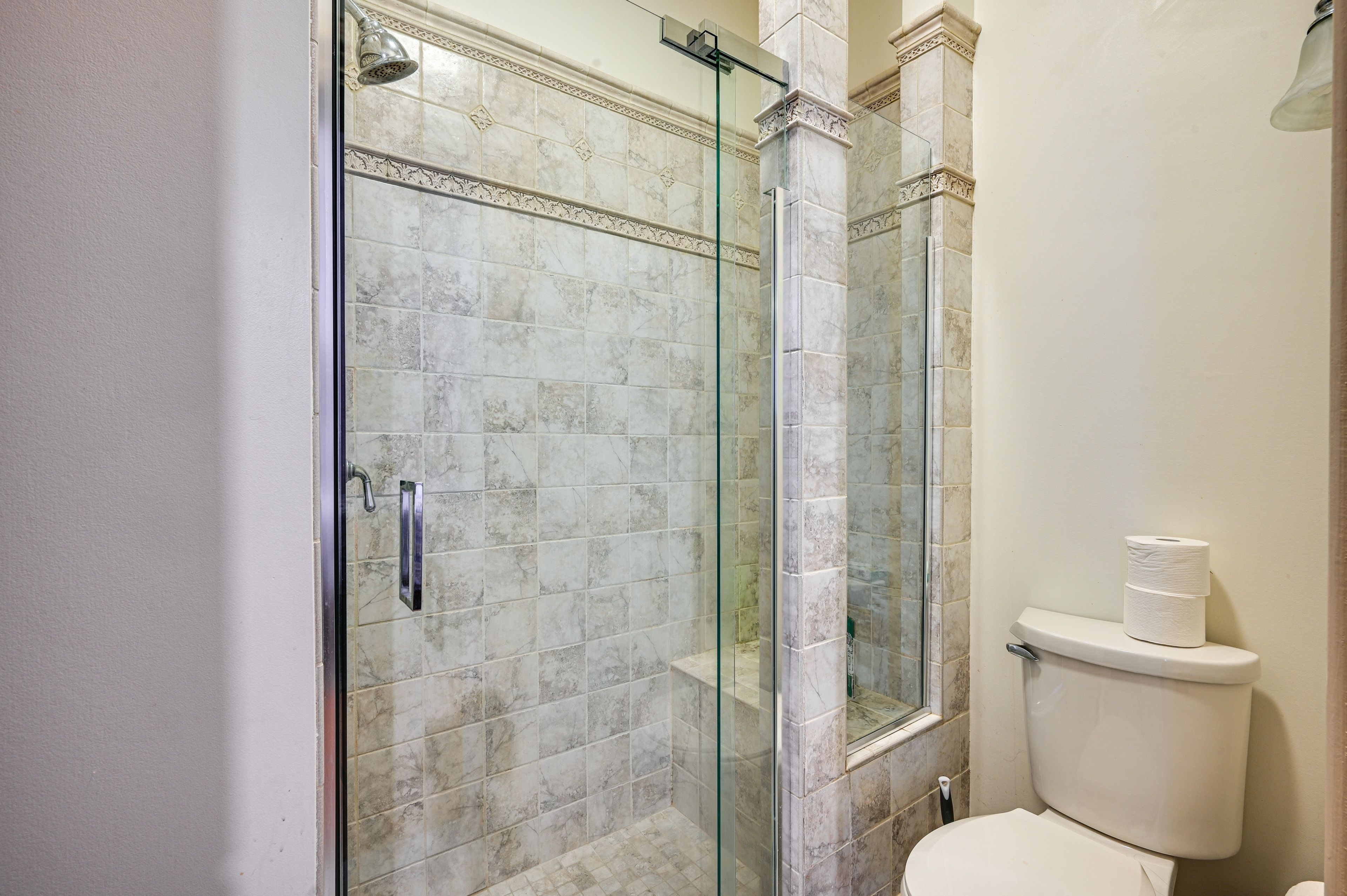 Jack-and-Jill Bathroom | Access via Bedrooms 3 & 4 | Hair Dryer Provided