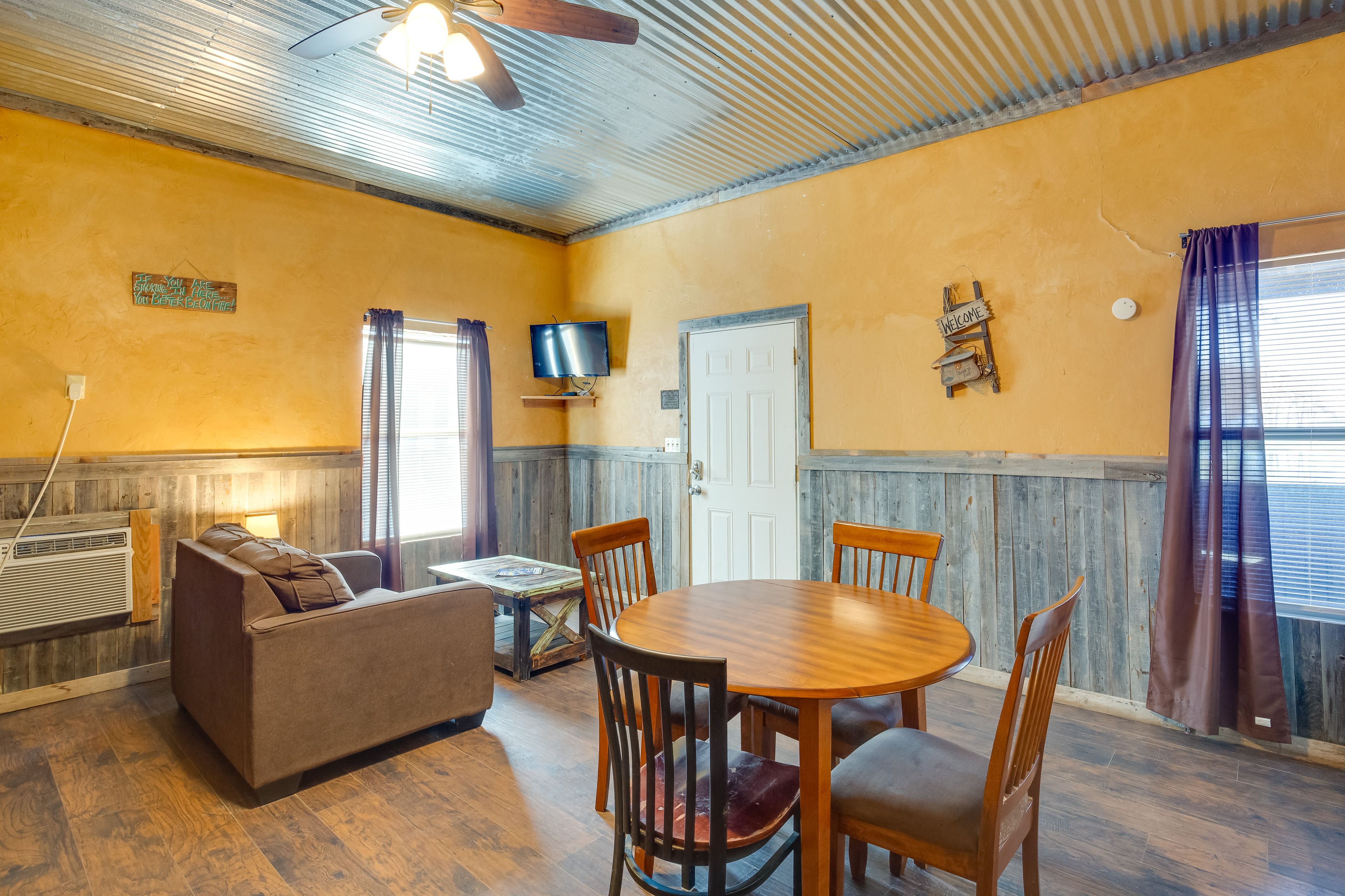 Studio Living Area | Twin Sleeper Ottoman | Flat-Screen TV
