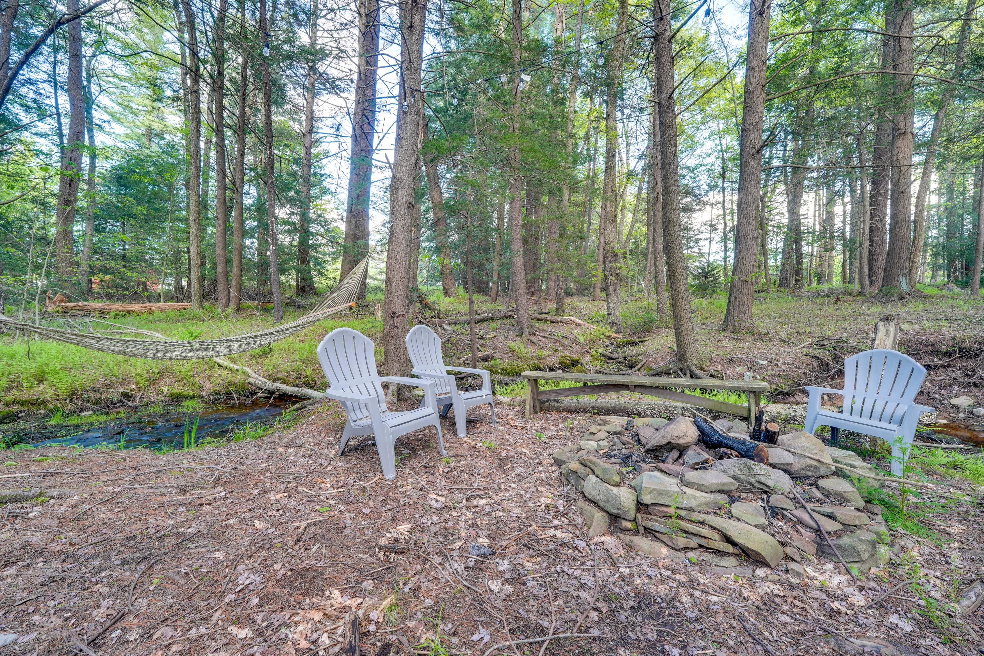 Unfenced Yard | Wood-Burning Fire Pit w/ Seating | Hammock | On-Site Creek