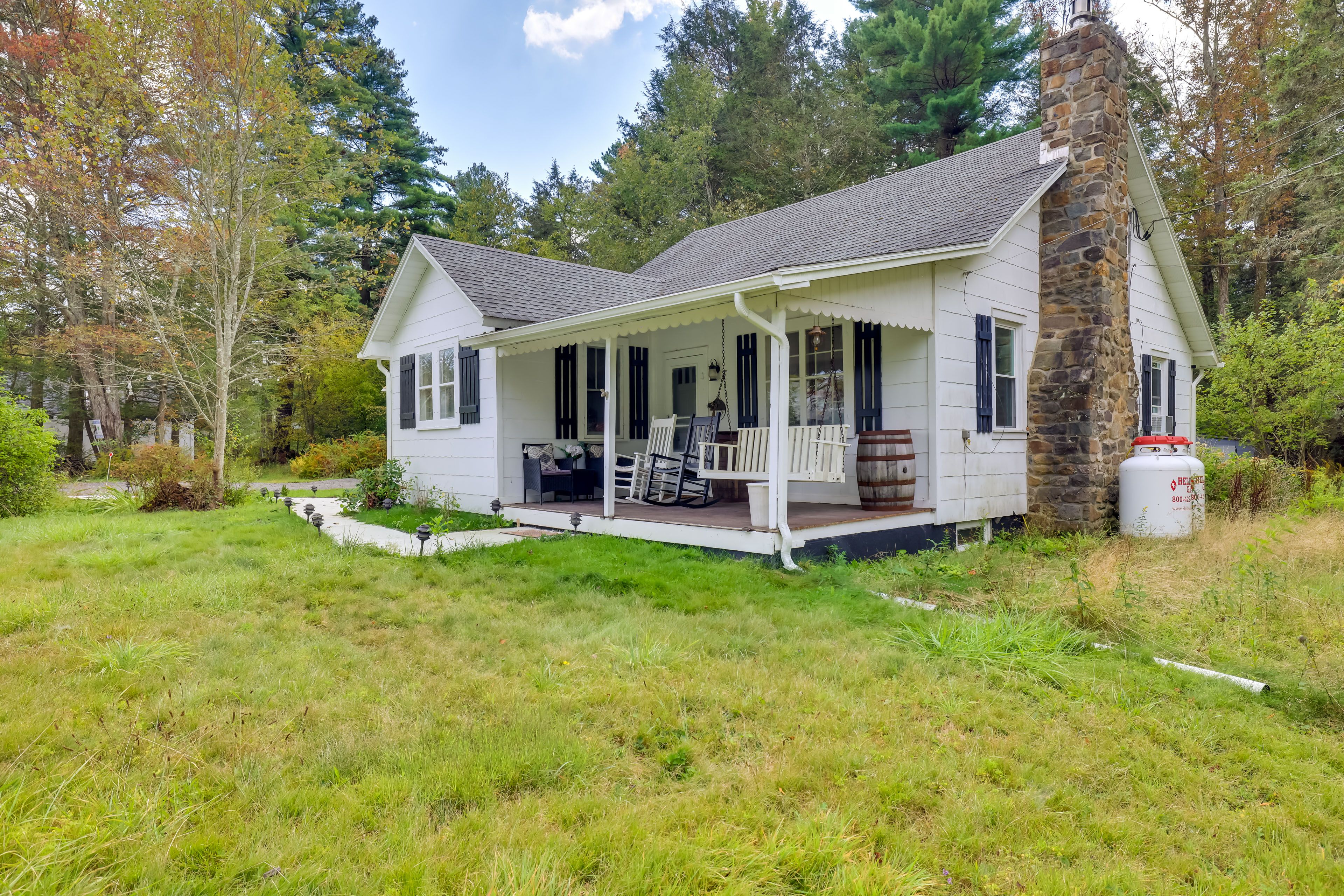 Property Exterior | Covered Porch | Porch Swing
