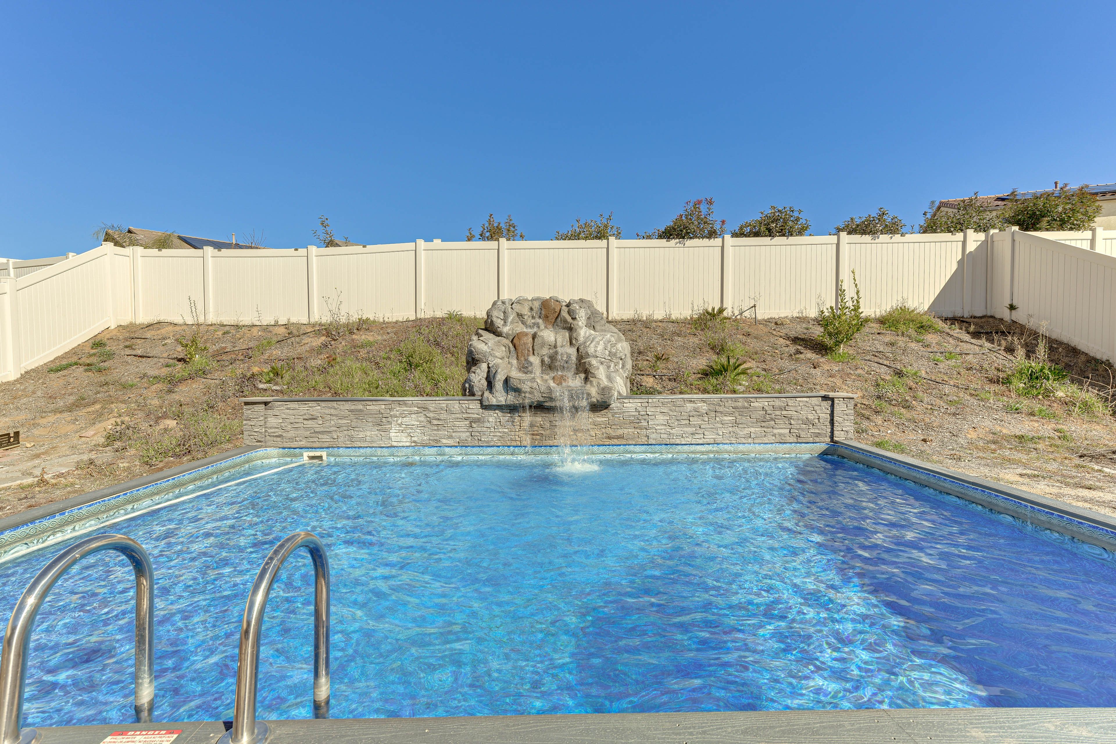 House Exterior | Private Pool w/ Waterfall
