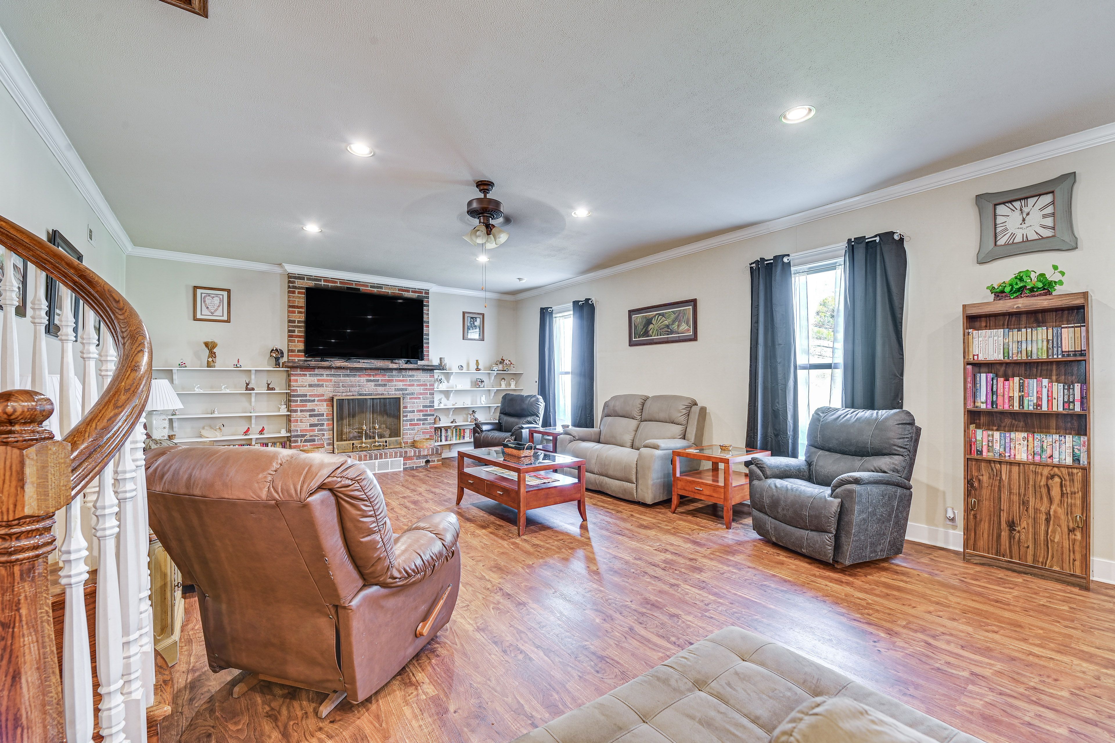 Living Room | Gas Fireplace | Flat-Screen TV | Books | 1st Floor