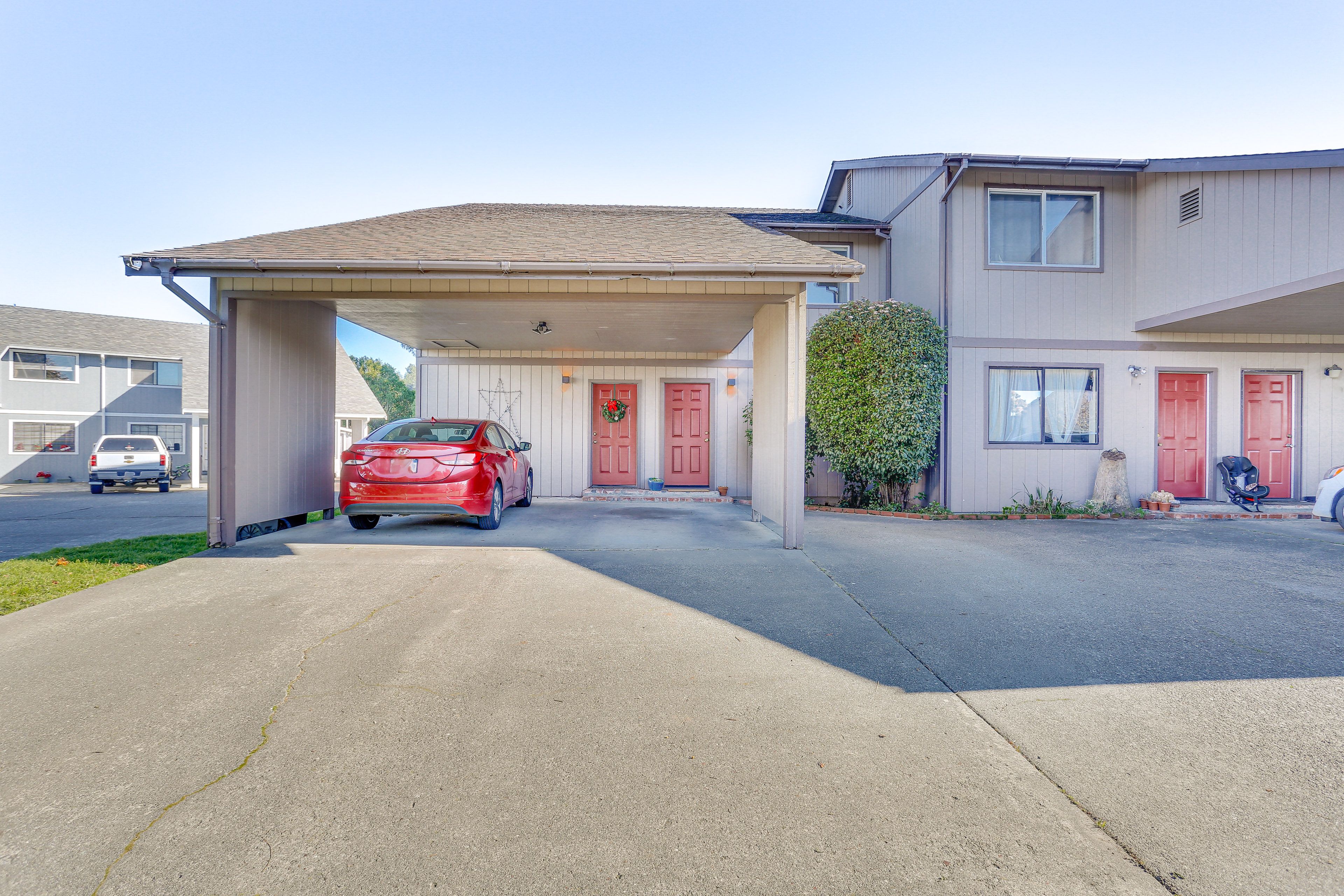 Apartment Exterior | Carport (2 Vehicles Tandem Parked)