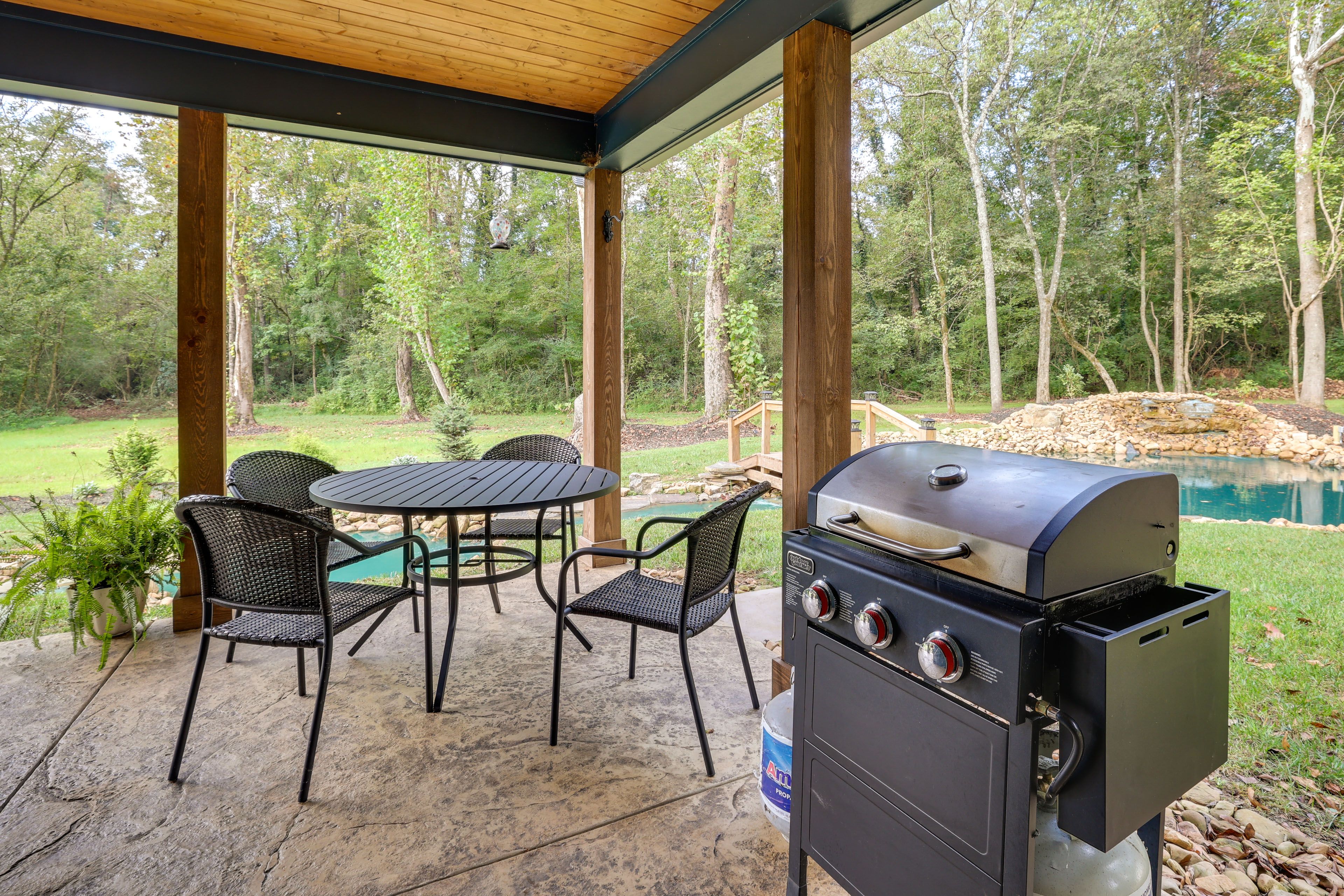 Wraparound Patio | Dining Area | Gas Grill | Rocking Chairs