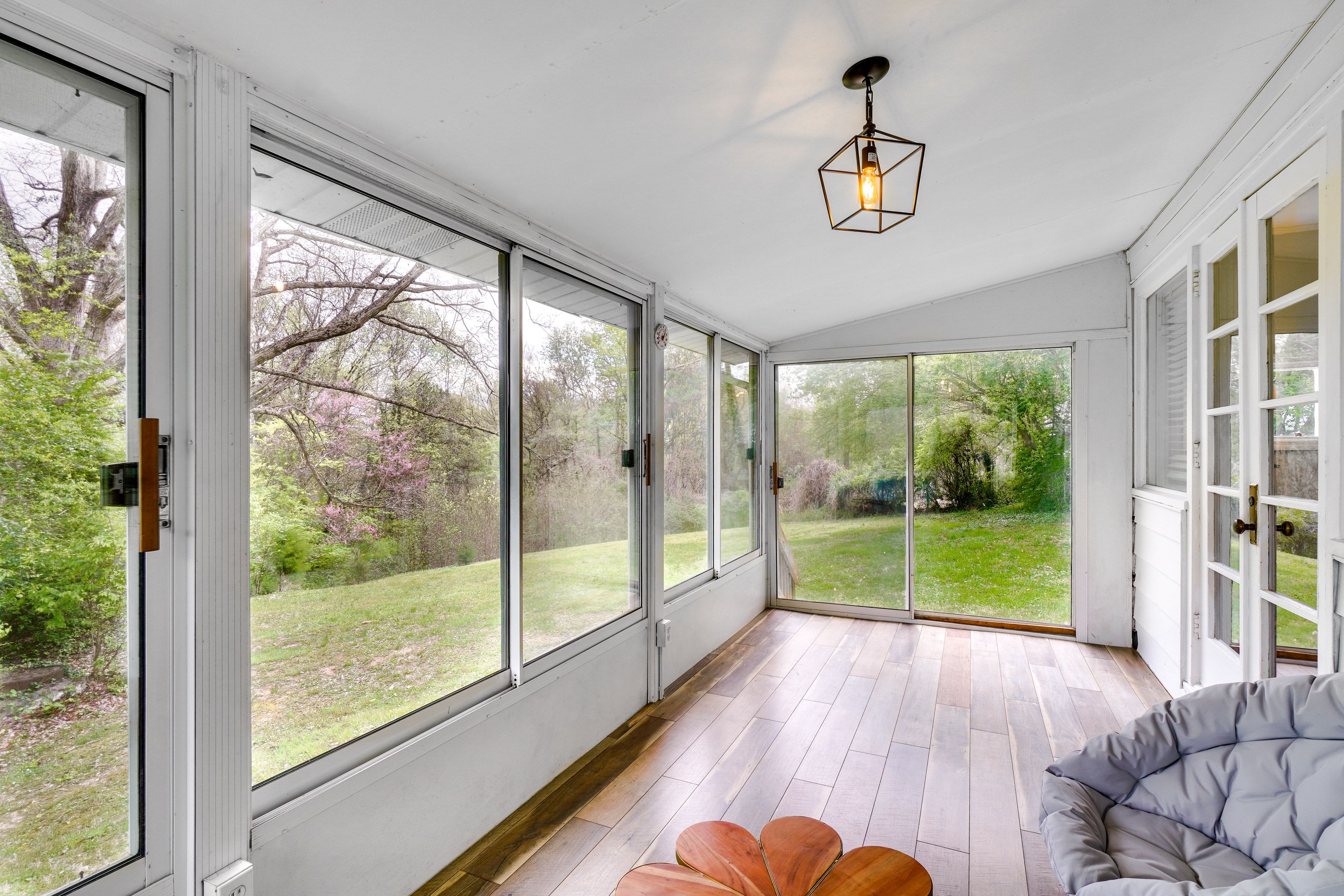 House Exterior | Screened Sunroom