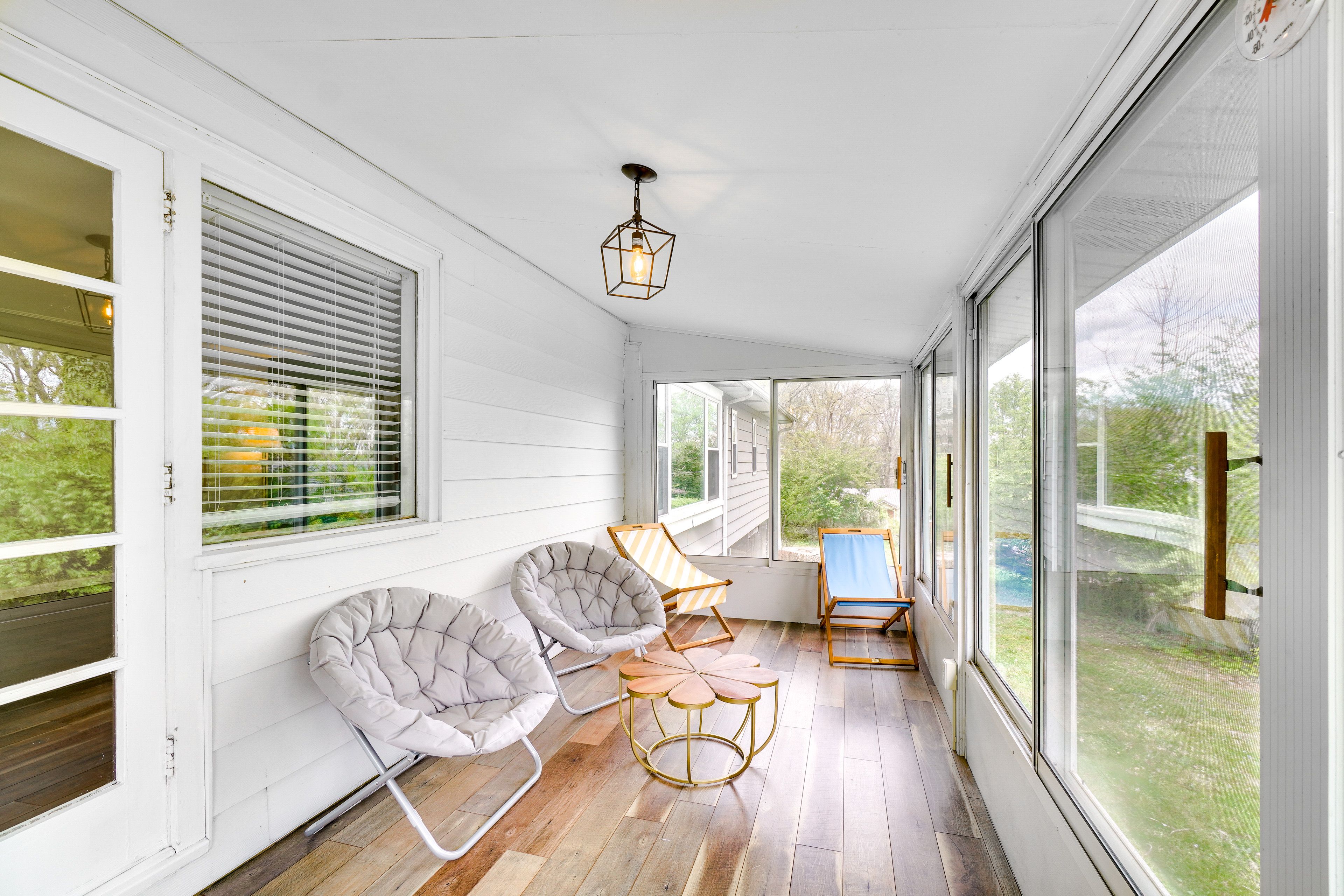 House Exterior | Screened Sunroom