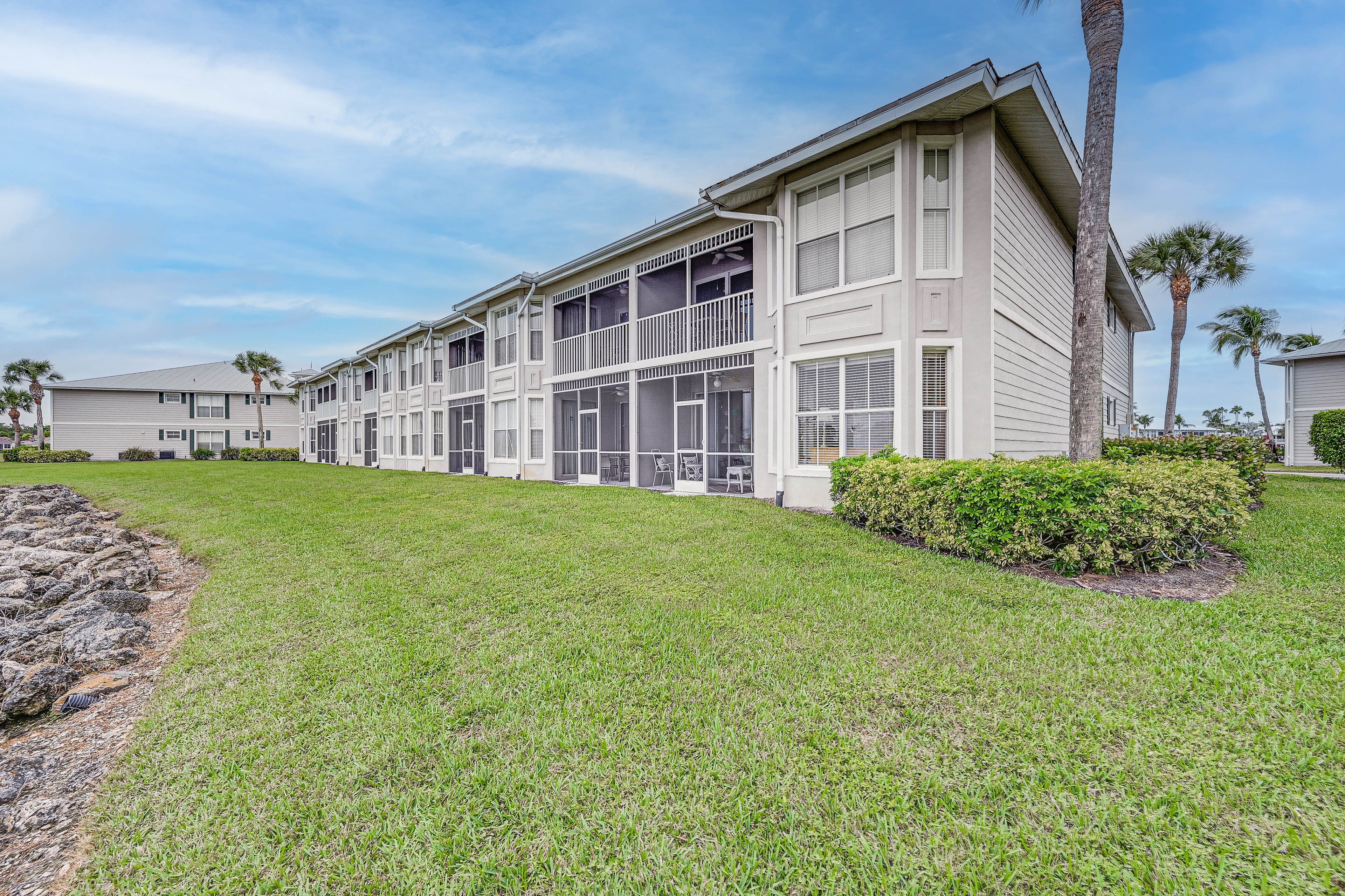 Condo Exterior | Screened-In Patio | Community Golf Course