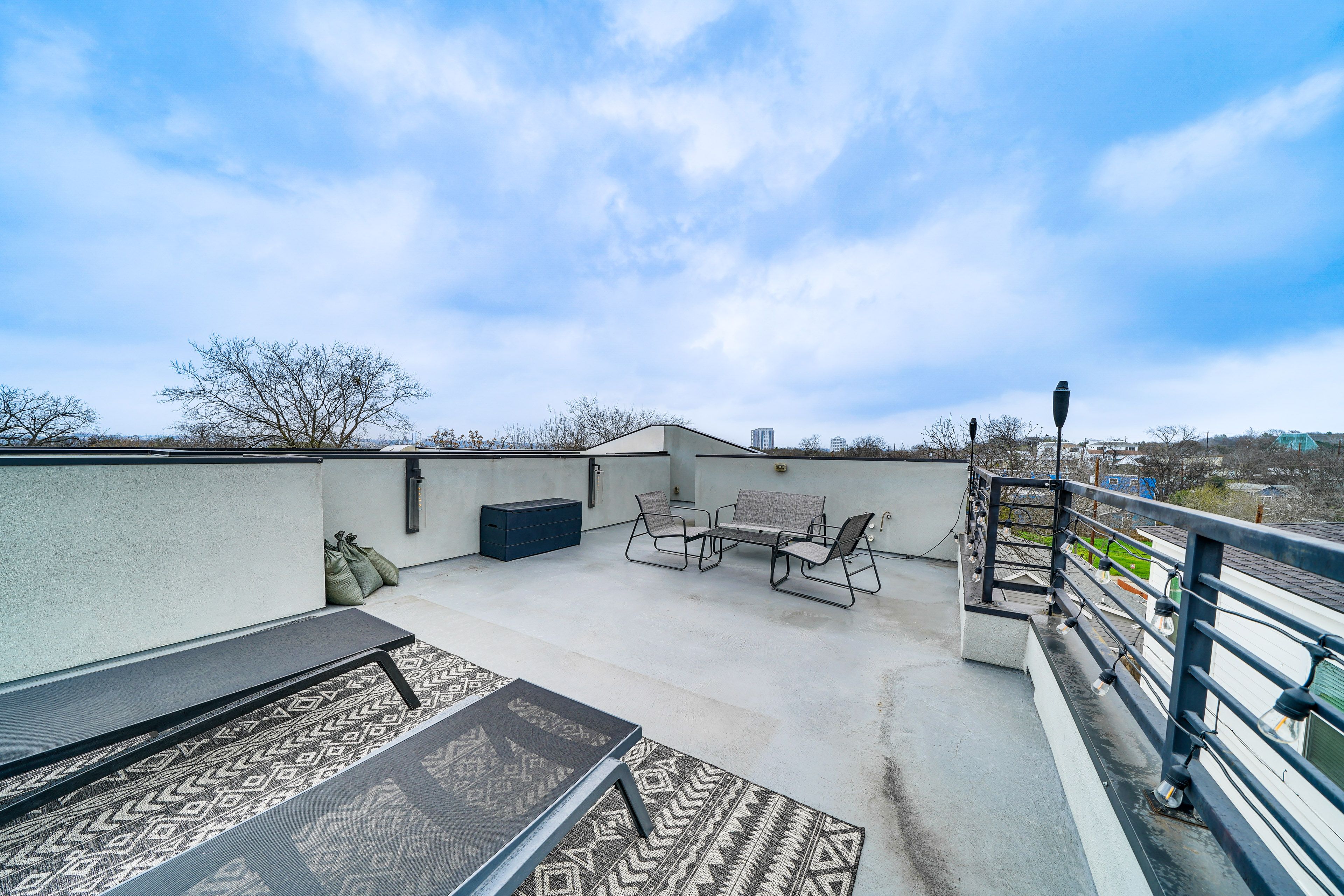 Condo Exterior | Furnished Rooftop Patio