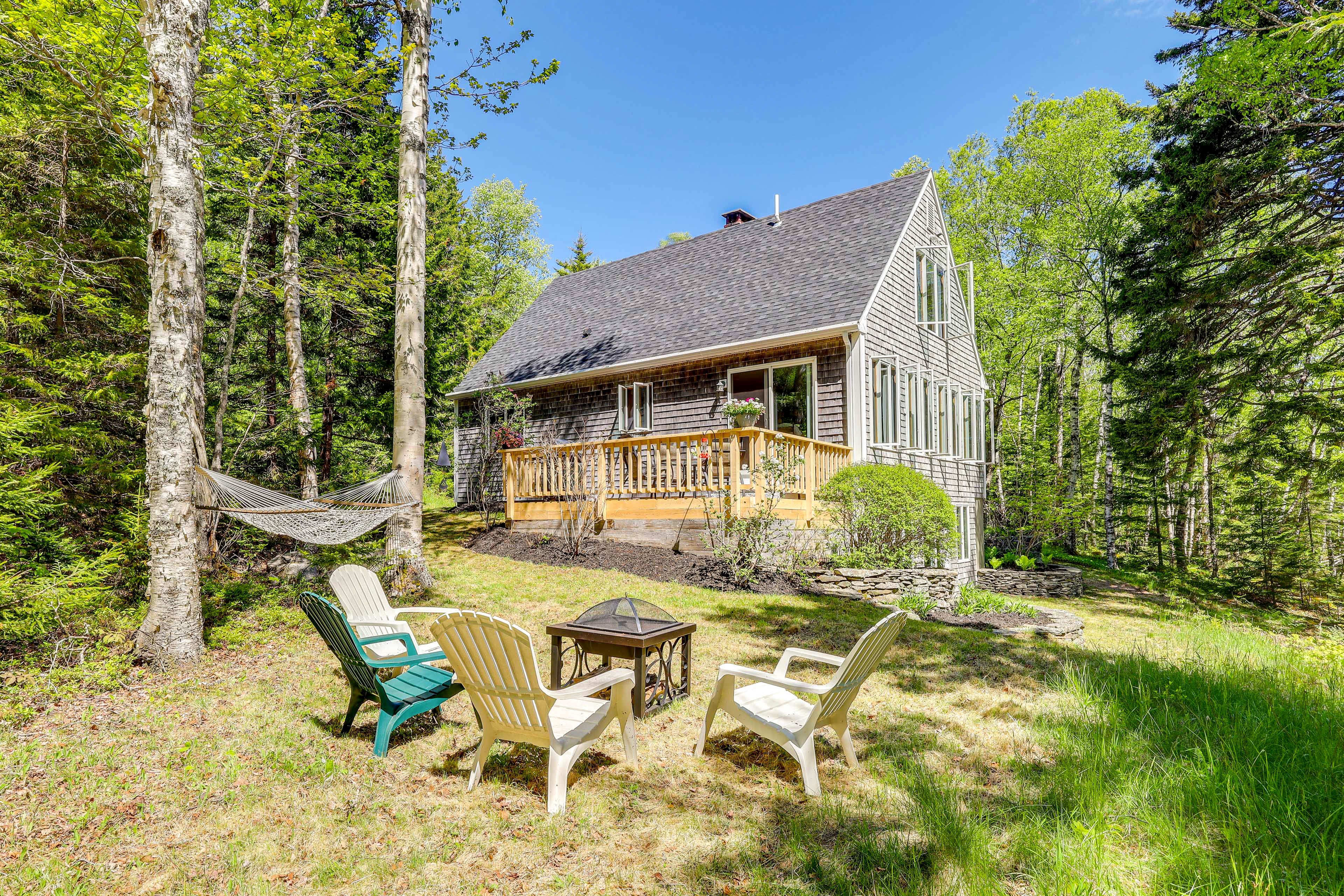 Property Exterior | 3-Story Home | Fire Pit | Hammock