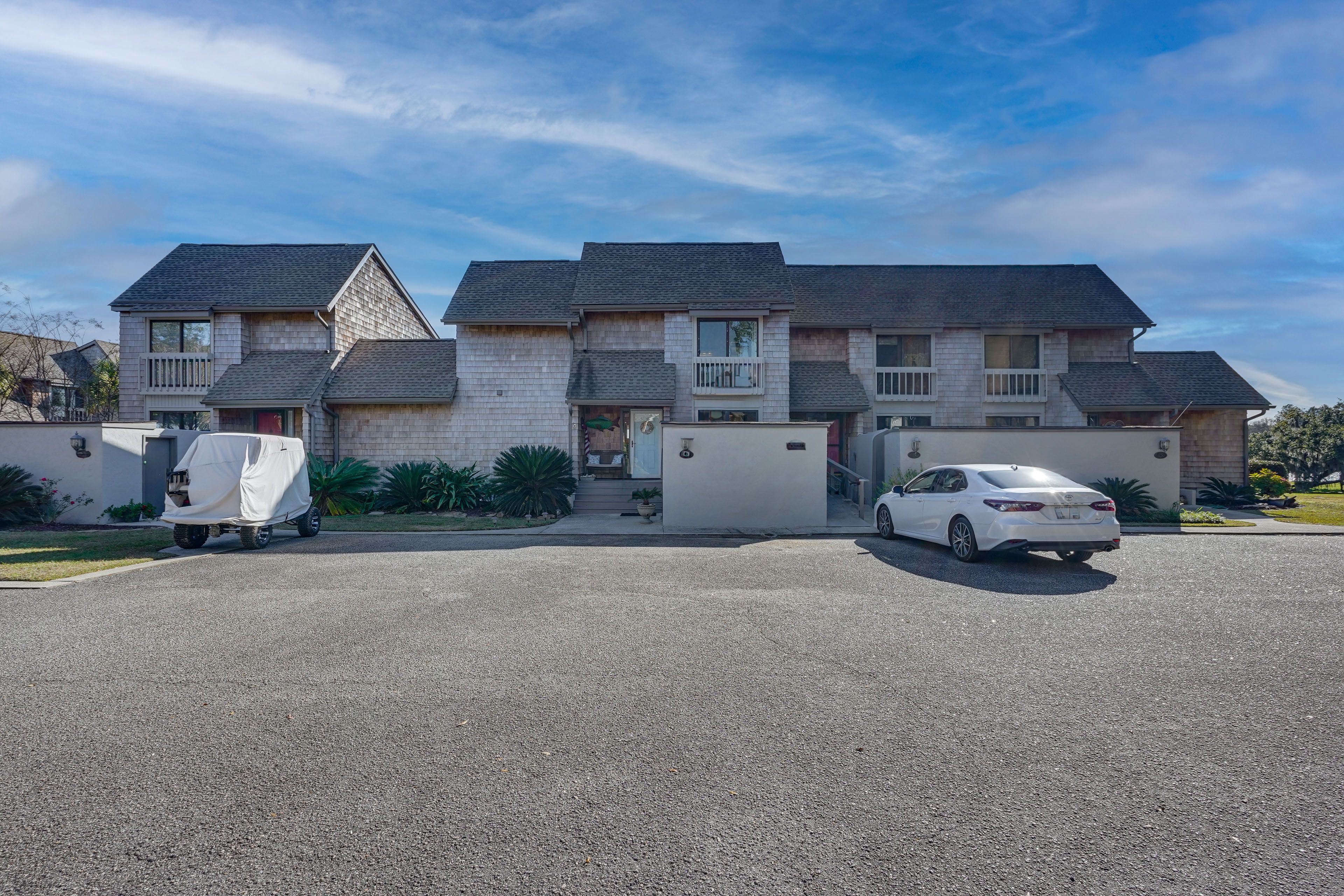 Parking | Community Lot (2 Vehicles w/ Parking Passes)