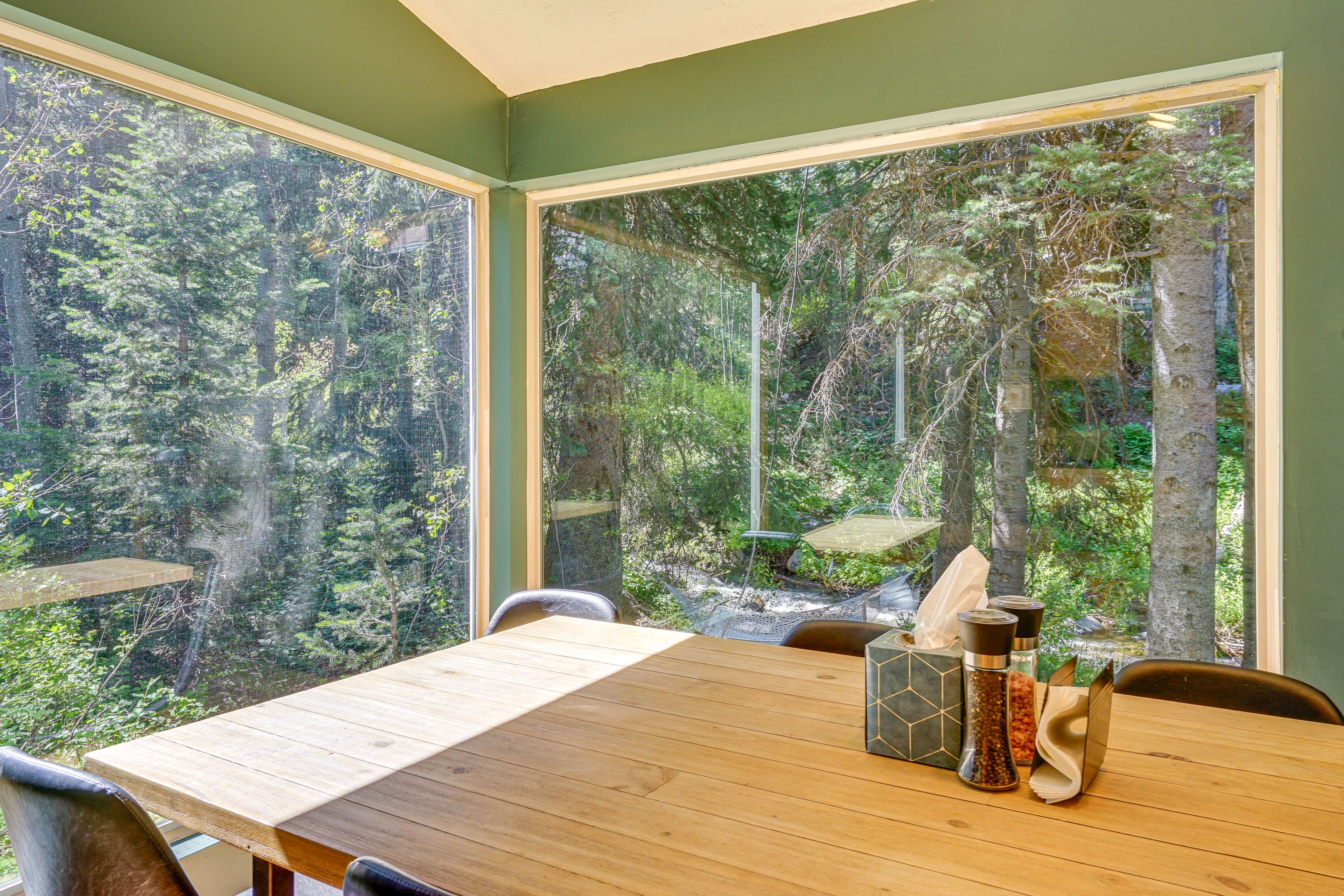 Dining Area | Forest Views | On-Site River