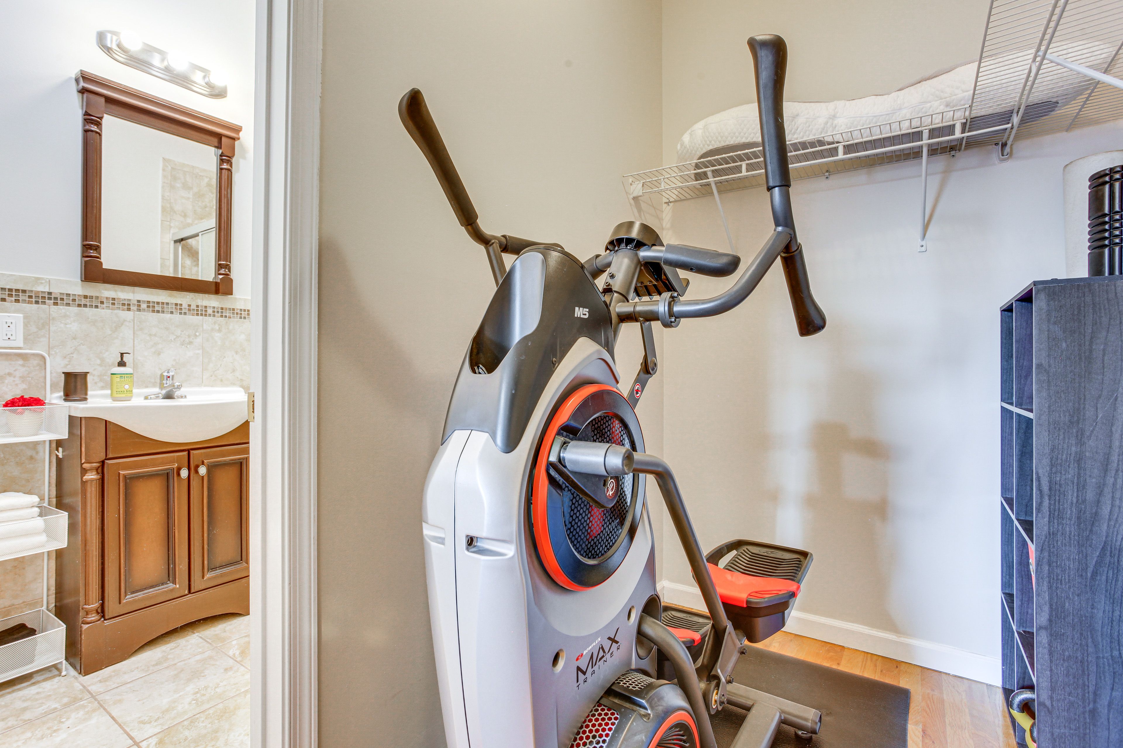 Bedroom 1 | Walk-In Closet | Elliptical Machine