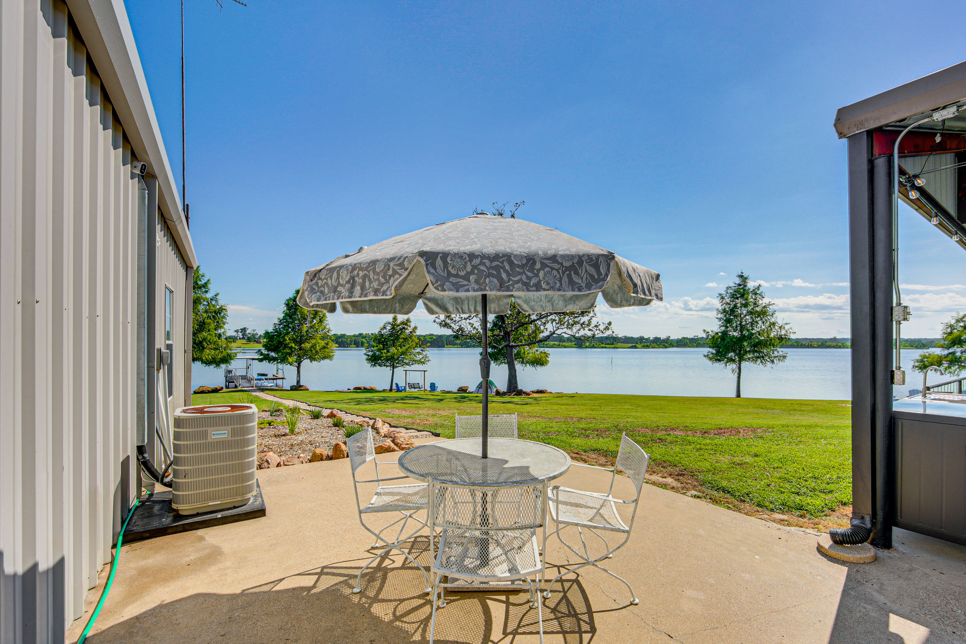 Patio | Gas Grill | Outdoor Dining Area | Lake Views