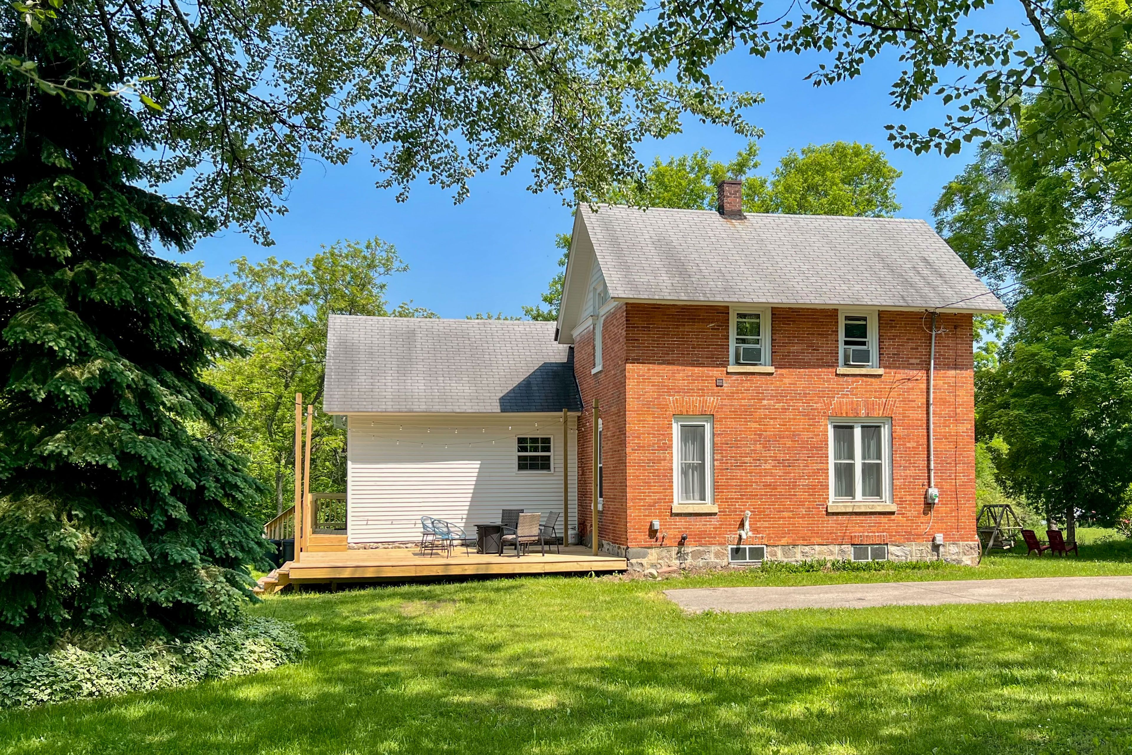 East Jordan Vacation Rental | 4BR | 2.5BA | Stairs Required | 2,000 Sq Ft