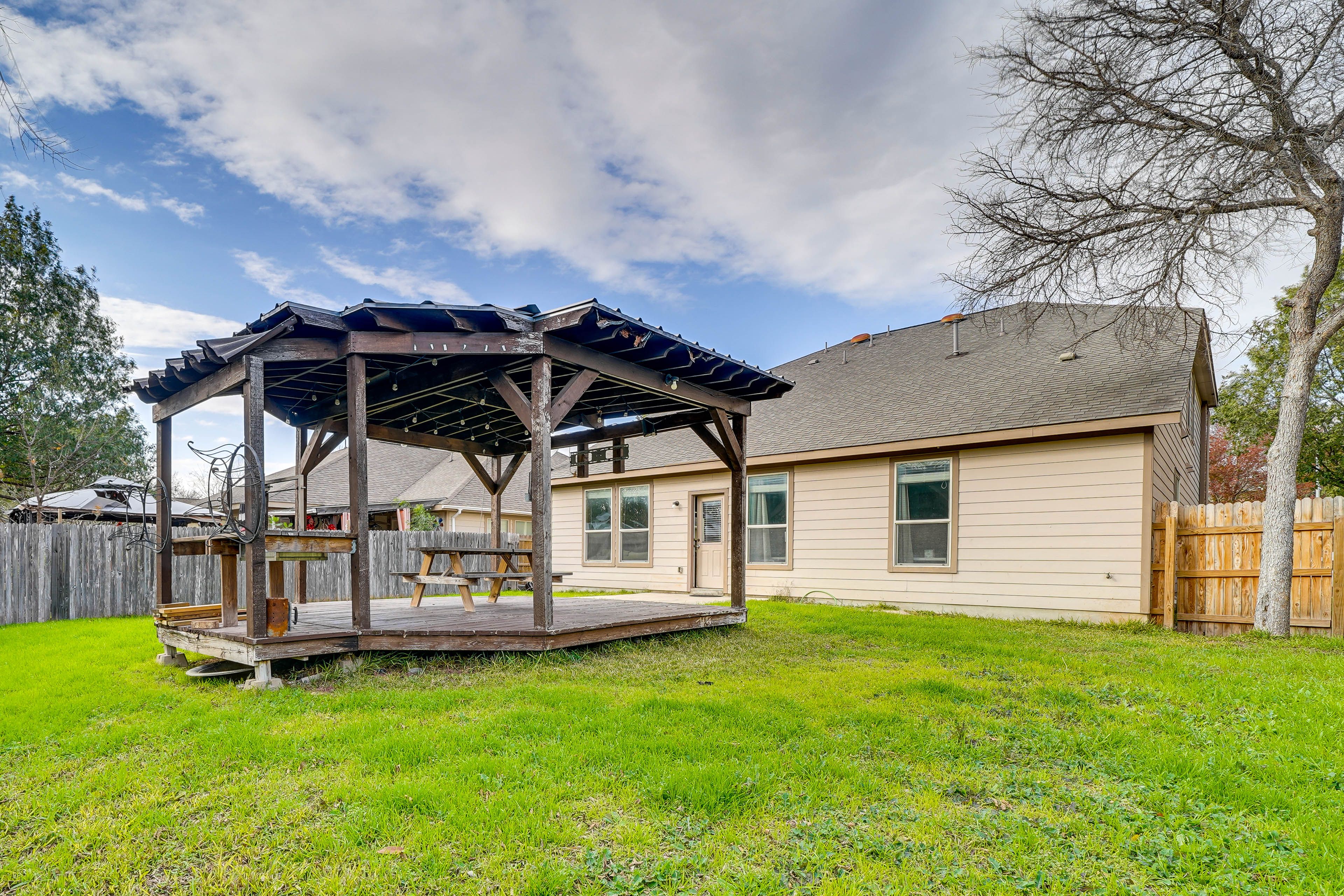 House Exterior | Fenced Backyard | Gazebo | Picnic Table