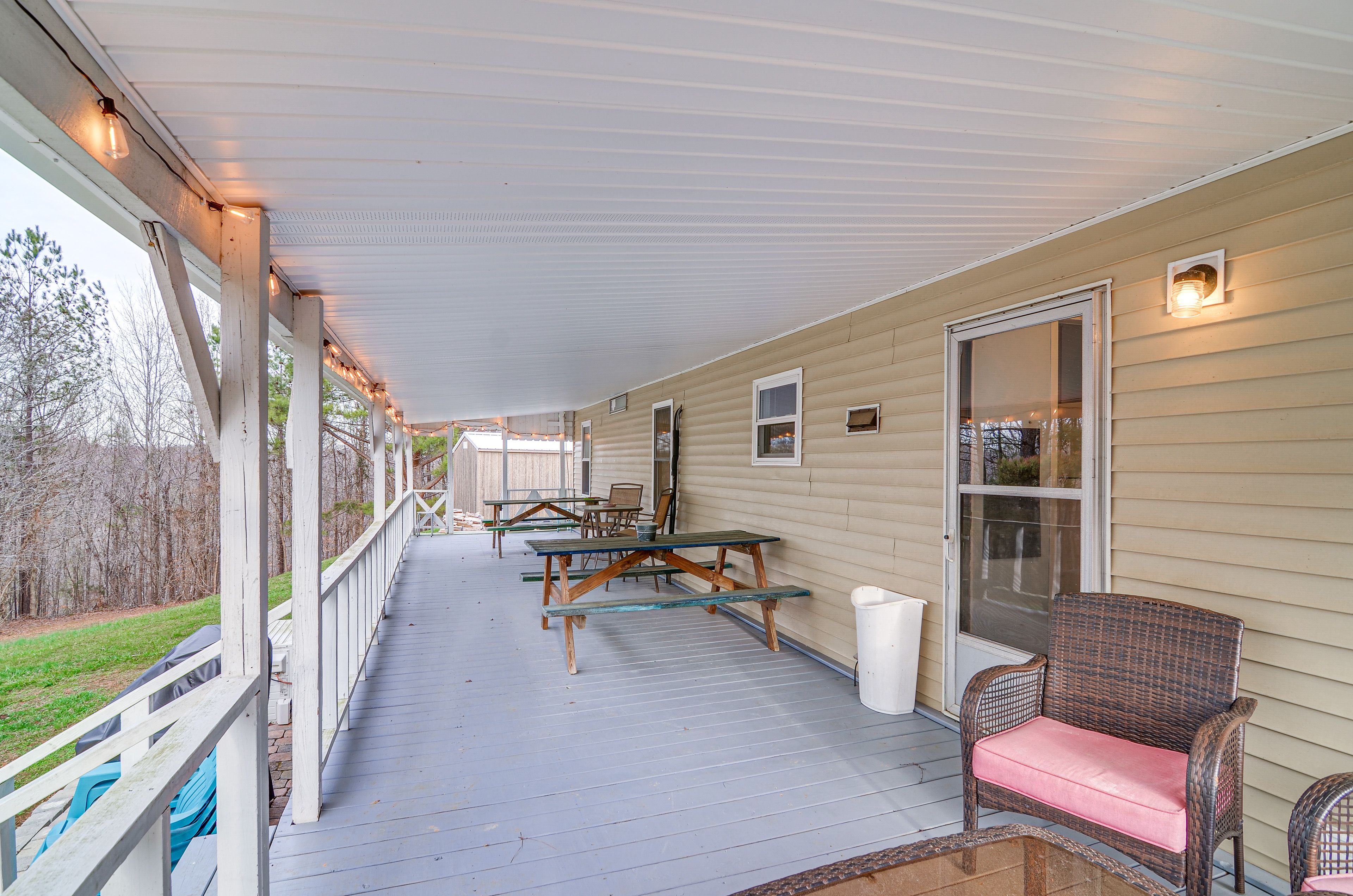 House Exterior | Furnished Deck | 2 Picnic Tables