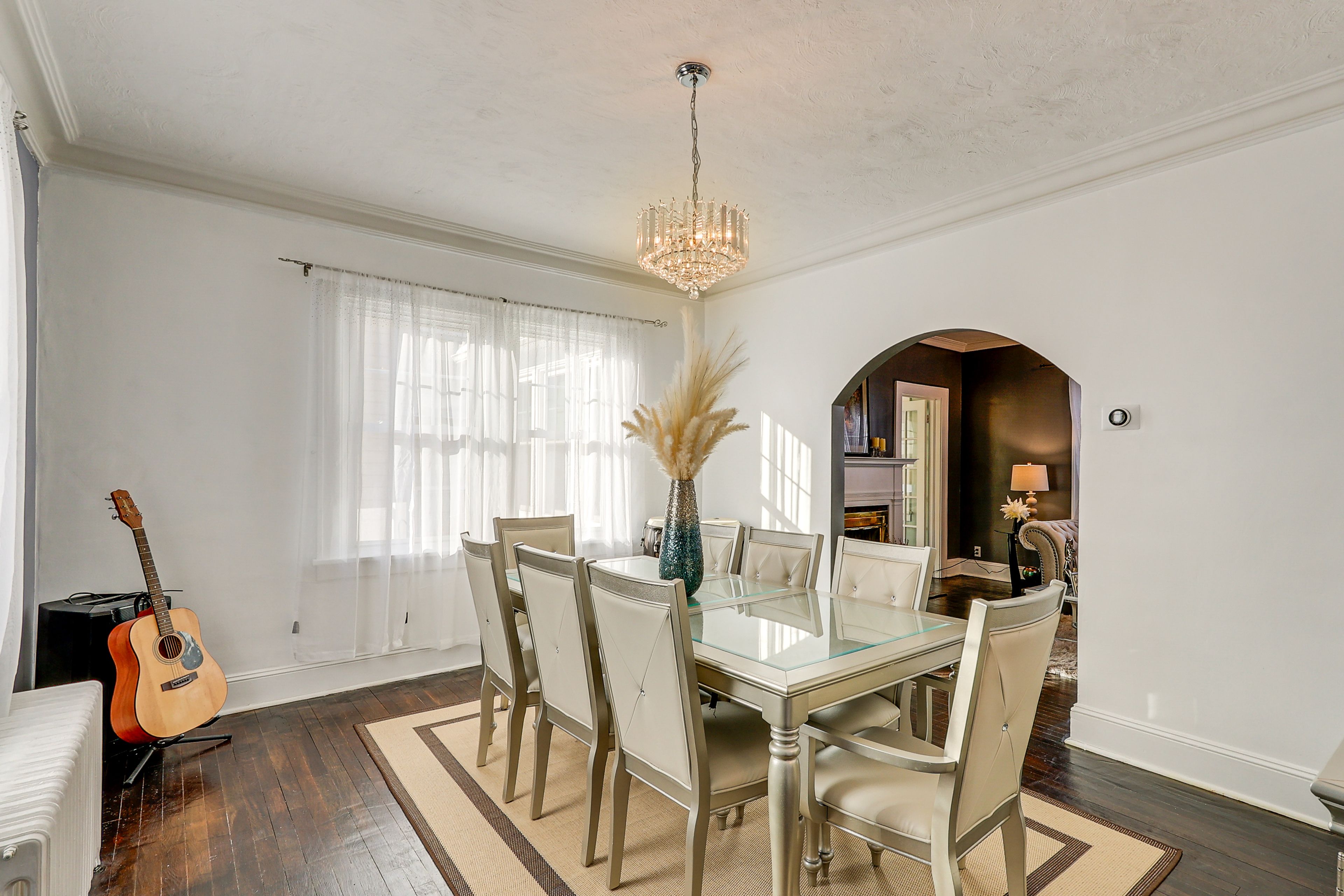 Dining Area | 1st Floor | Dining Table | Dishware/Flatware | Guitar