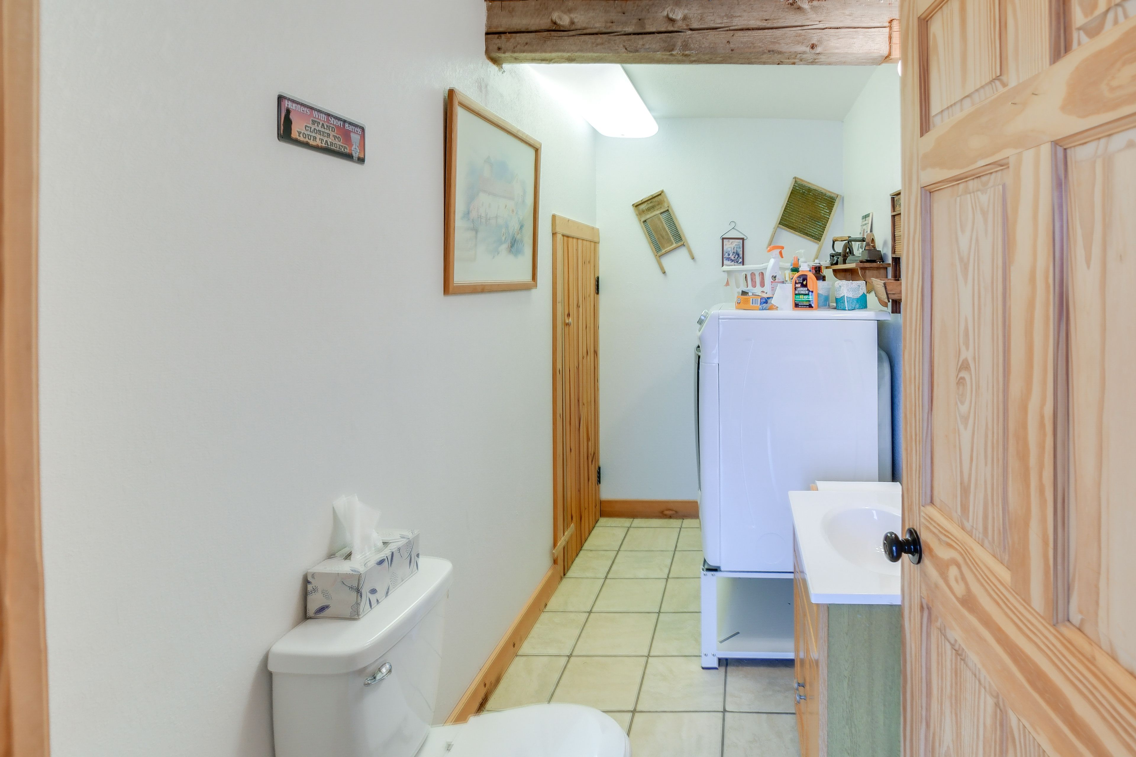 Half Bathroom | Main Level | Washer & Dryer
