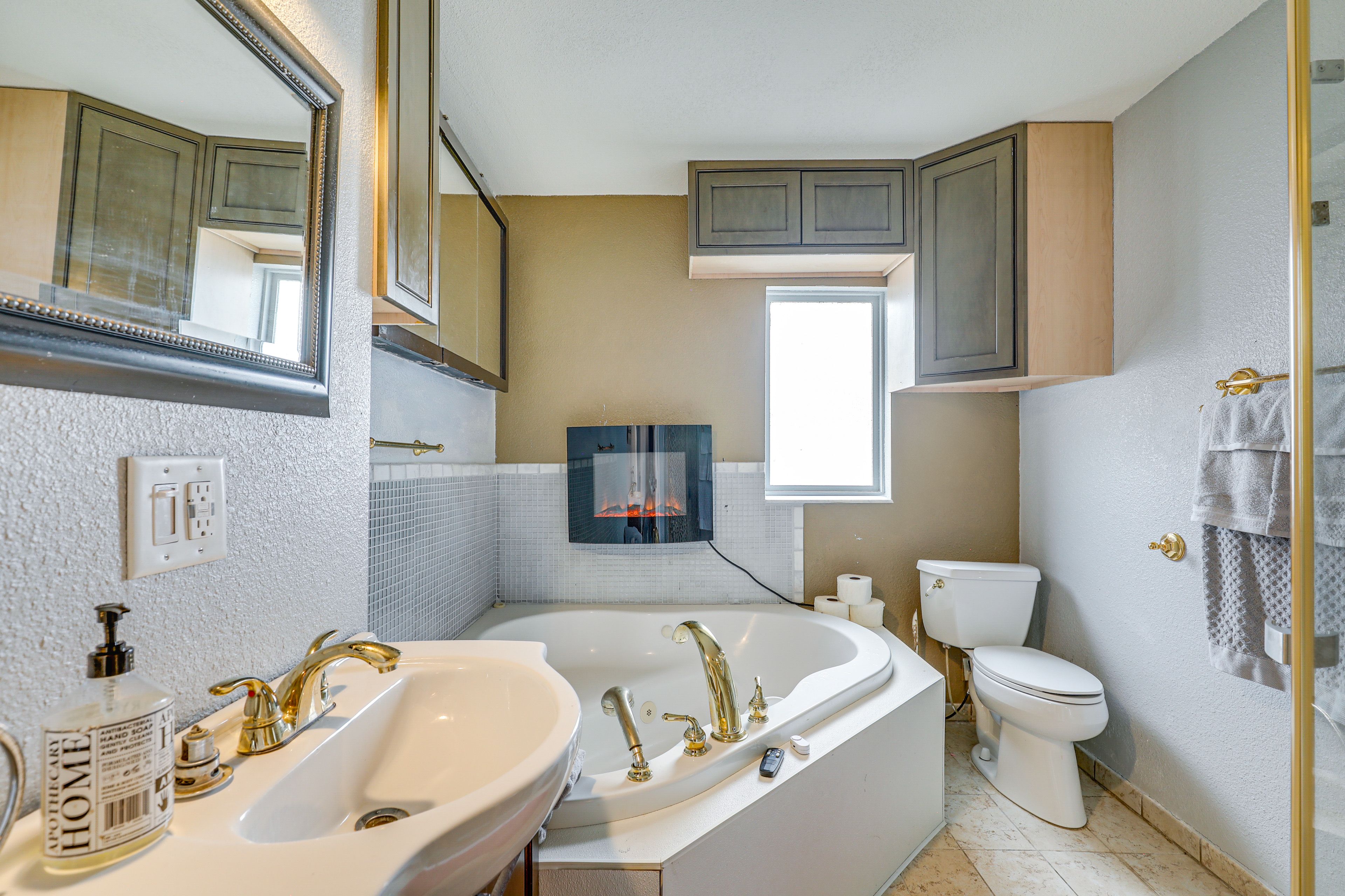 Full Bathroom | Jetted Tub | Electric Fireplace